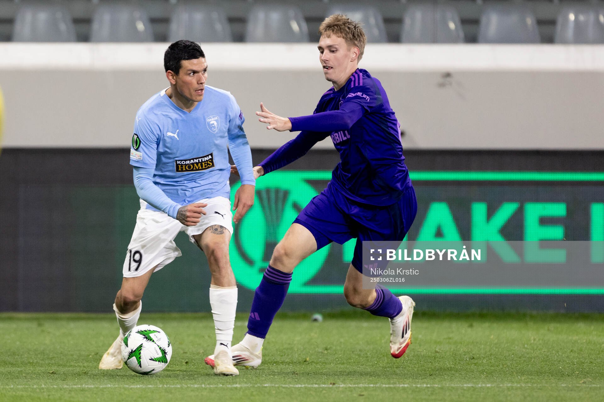 Jonathan Silva of Pafos and Santeri Haarala of Djurgården during the Conference League football match between Pafos and Djurgården on March 6, 2025 in Limassol.