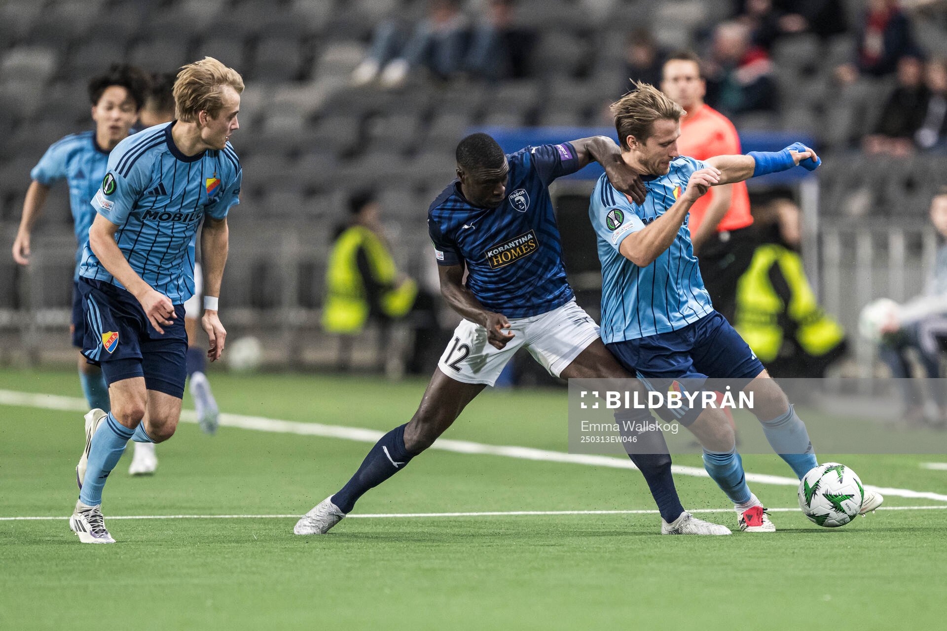 Ken Sema of Pafos and Oskar Fallenius and Daniel Stensson of Djurgården during the UEFA Conference League football match between Djurgården and Pafos on March 13, 2025 in Stockholm.
