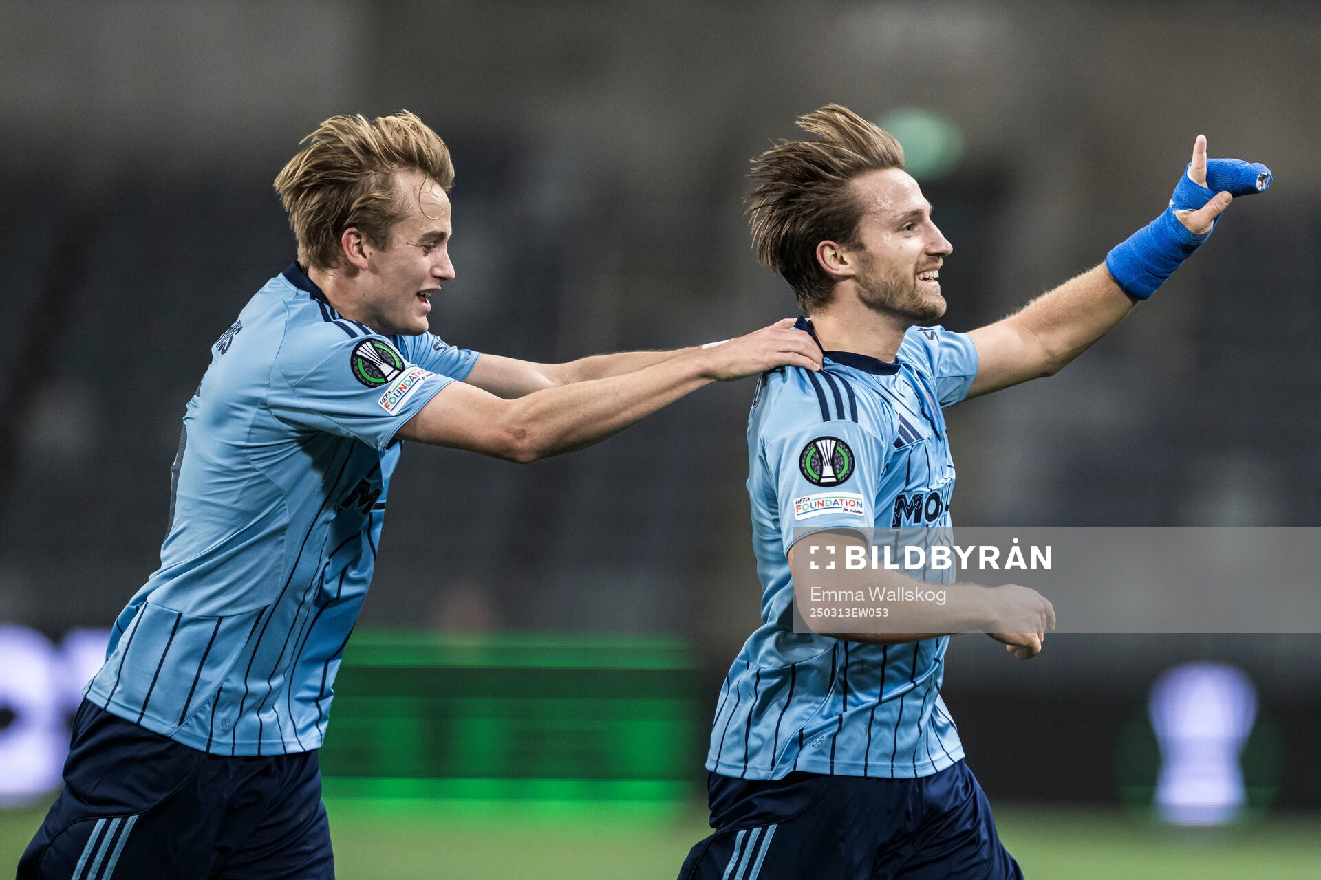 Daniel Stensson and Oskar Fallenius of Djurgården celebrate after 2-0 during the UEFA Conference League football match between Djurgården and Pafos on March 13, 2025 in Stockholm.