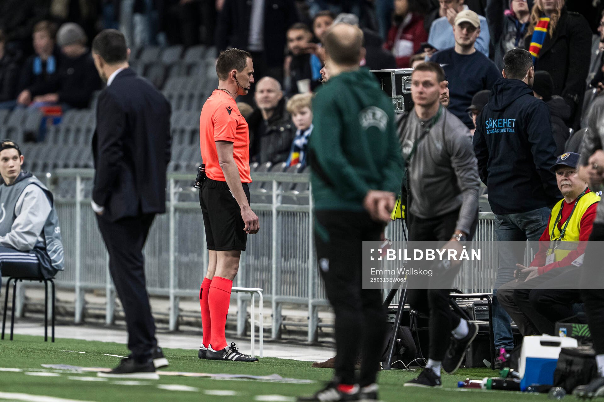 Referee Sebastian Gishamer with a VAR check of the 2-0 goal