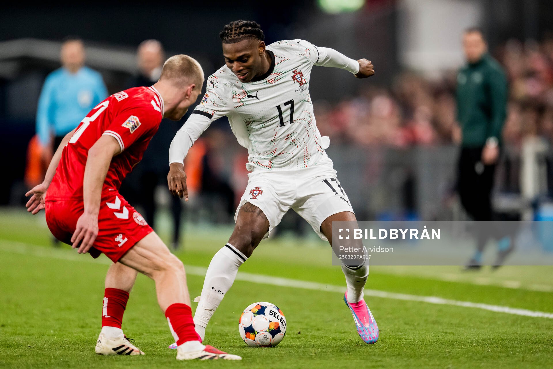Rasmus Kristensen of Denmark and Rafael Leao of Portugal