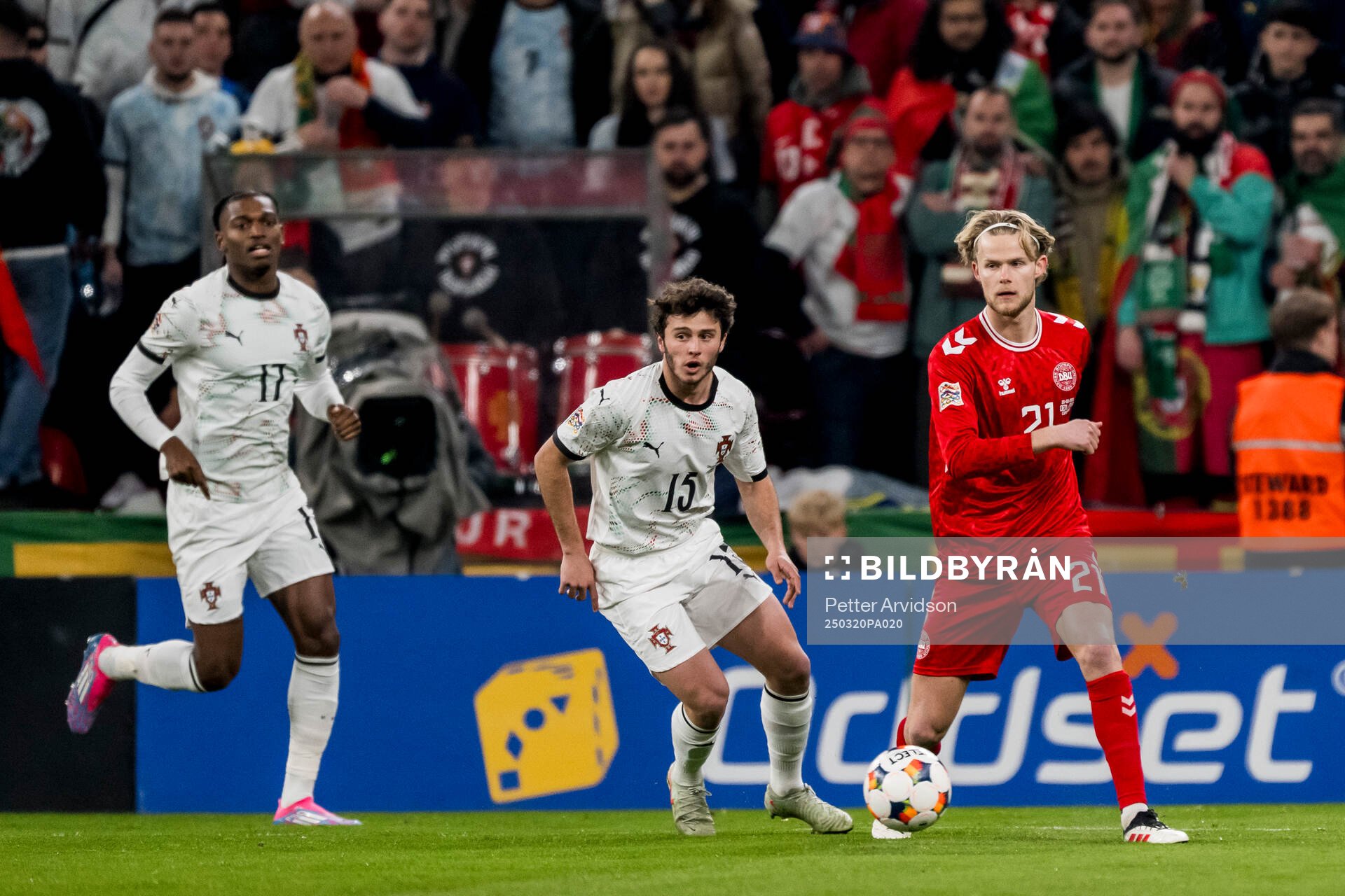 Joao Neves of Portugal and Morten Hjulmand of Denmark during the Nations League football match between Denmark and Portugal on March 20, 2025 in Copenhagen.