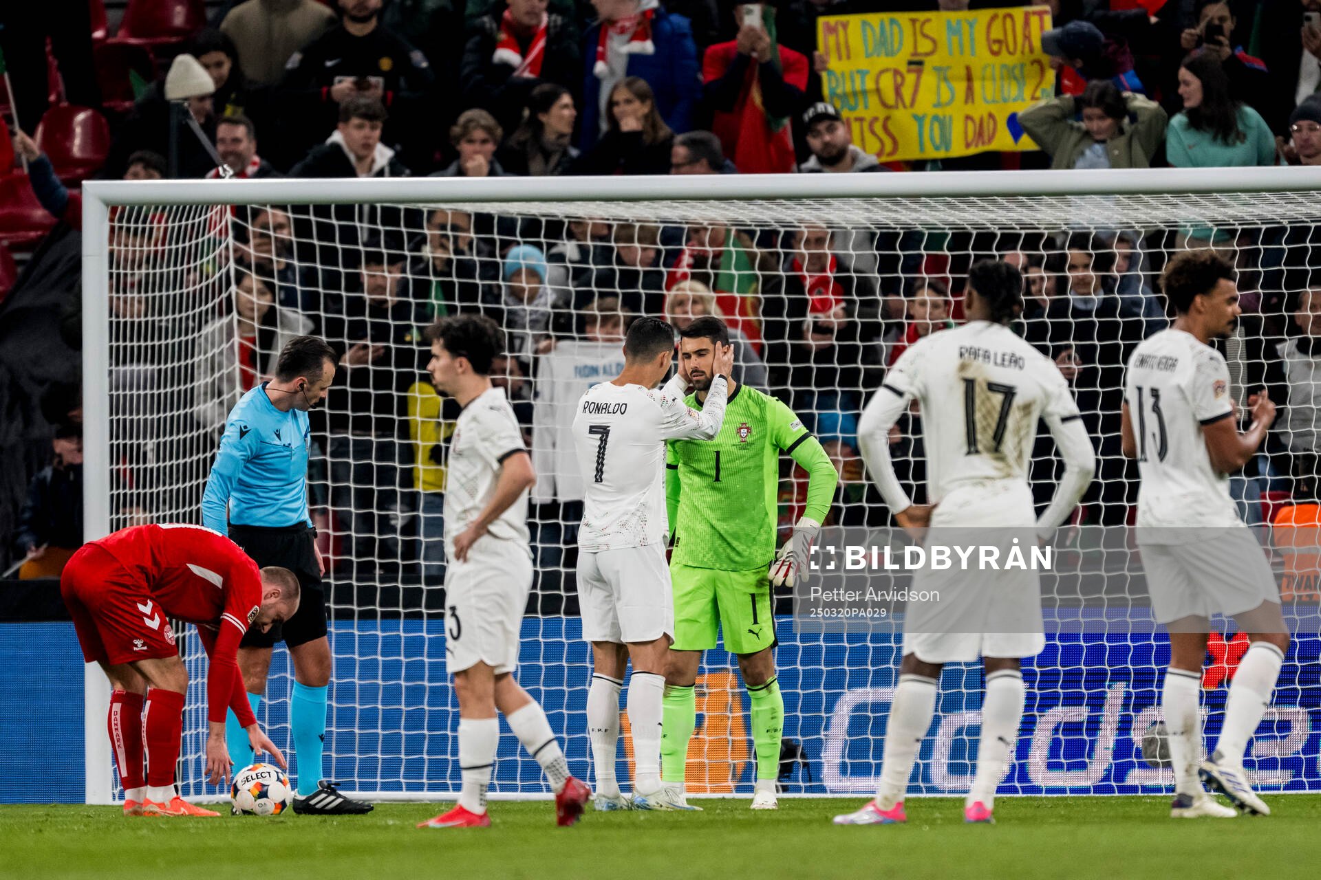 Cristiano Ronaldo and goalkeeper Diogo Costa of Portugal