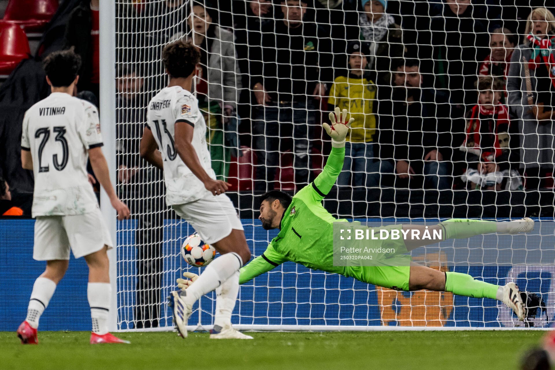 of Portugal goalkeeper Diogo Costa makes a save