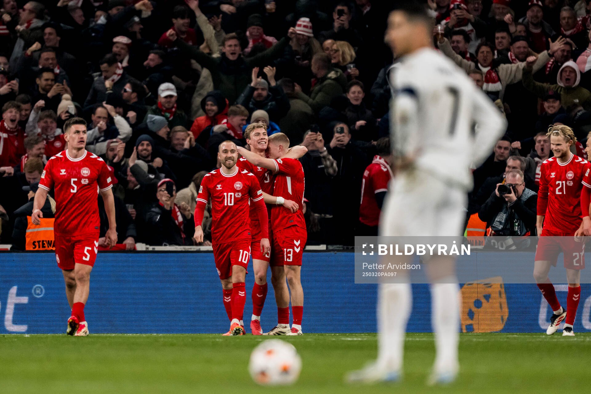 Rasmus Højlund of Denmark celebrates