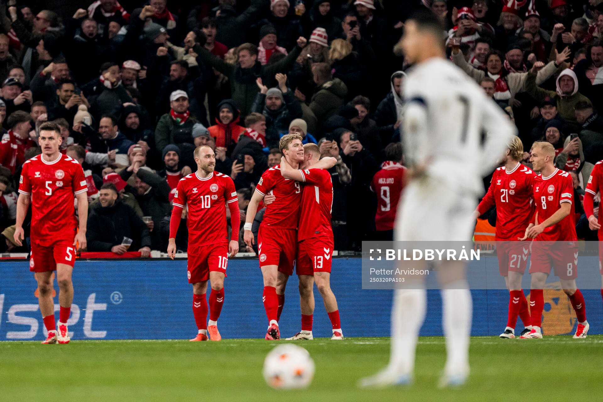Rasmus Højlund of Denmark celebrates