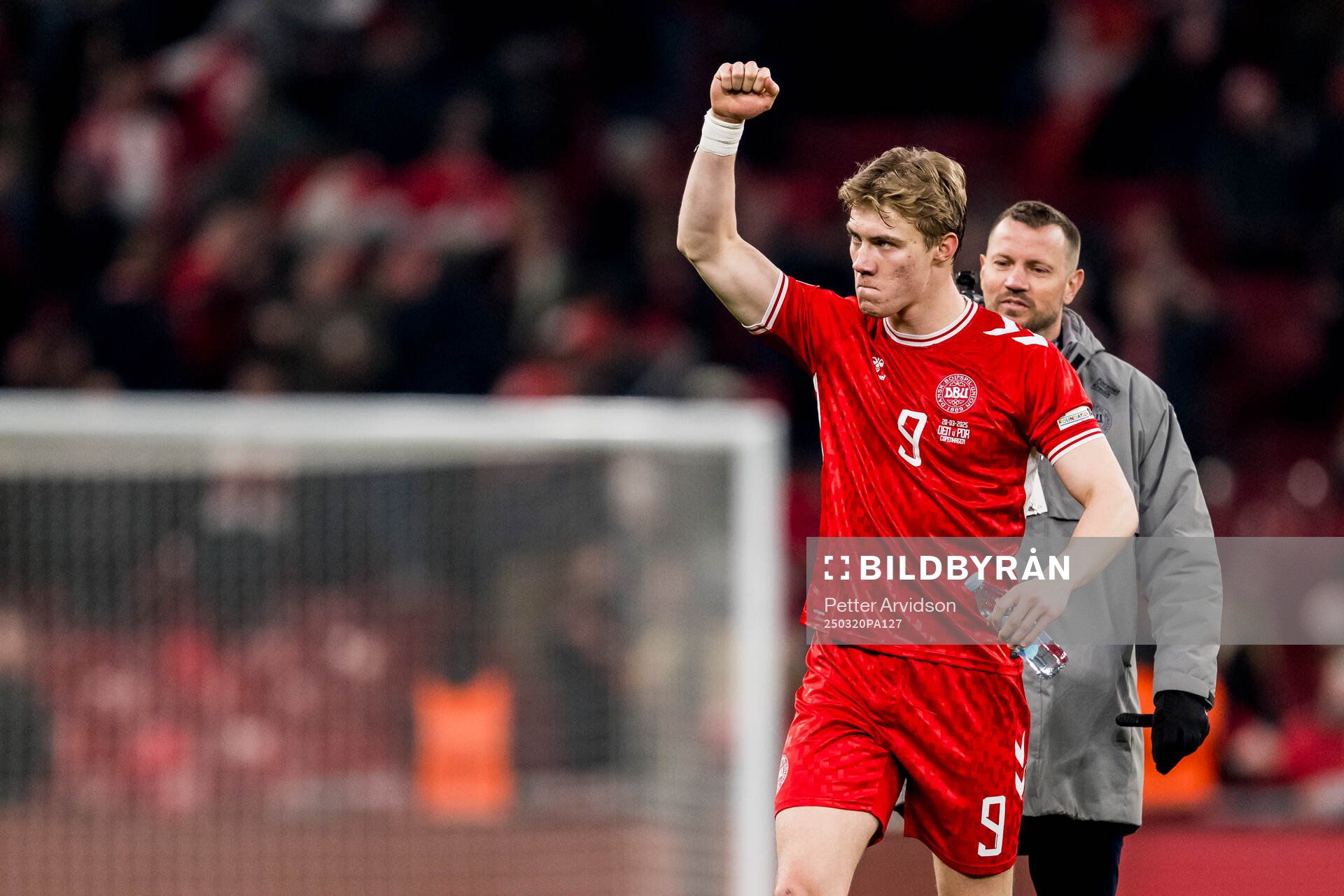 Rasmus Højlund of Denmark celebrates
