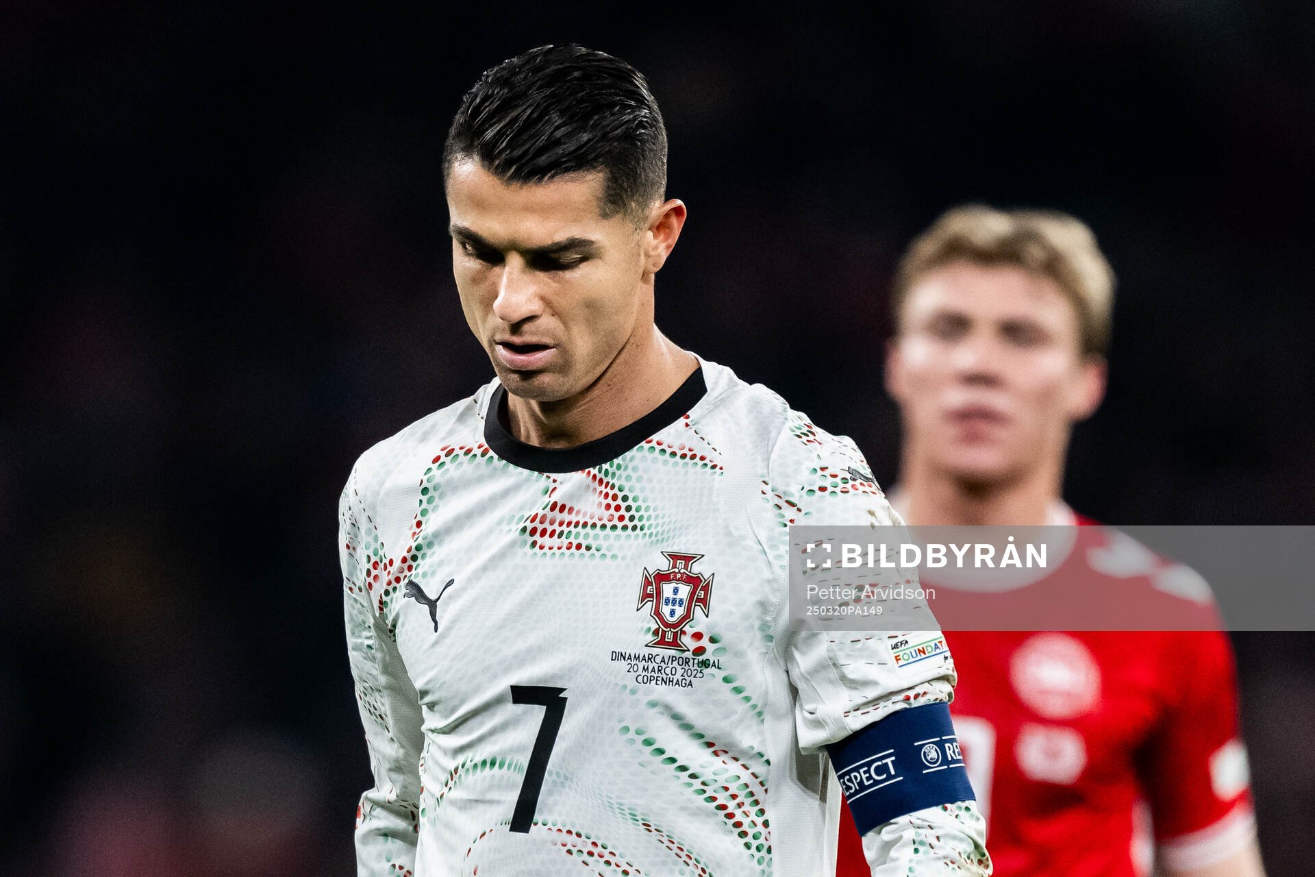 Cristiano Ronaldo of Portugal and Rasmus Højlund of Denmark