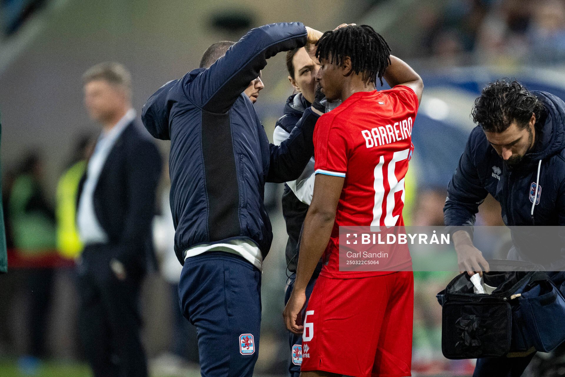 Leandro Barreiro of Luxembourg receives medical attention