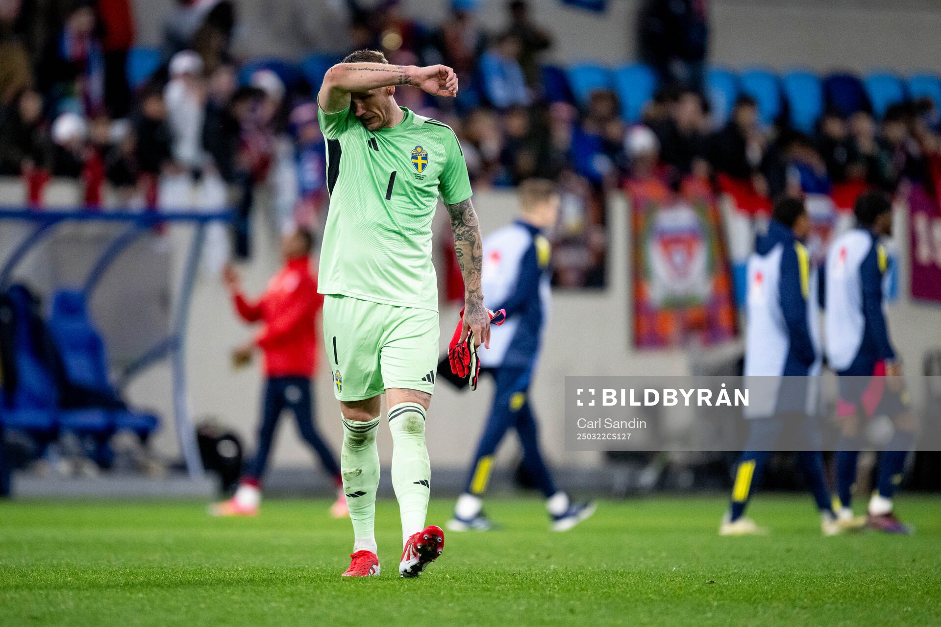Goalkeeper Robin Olsen of Sweden looks dejected