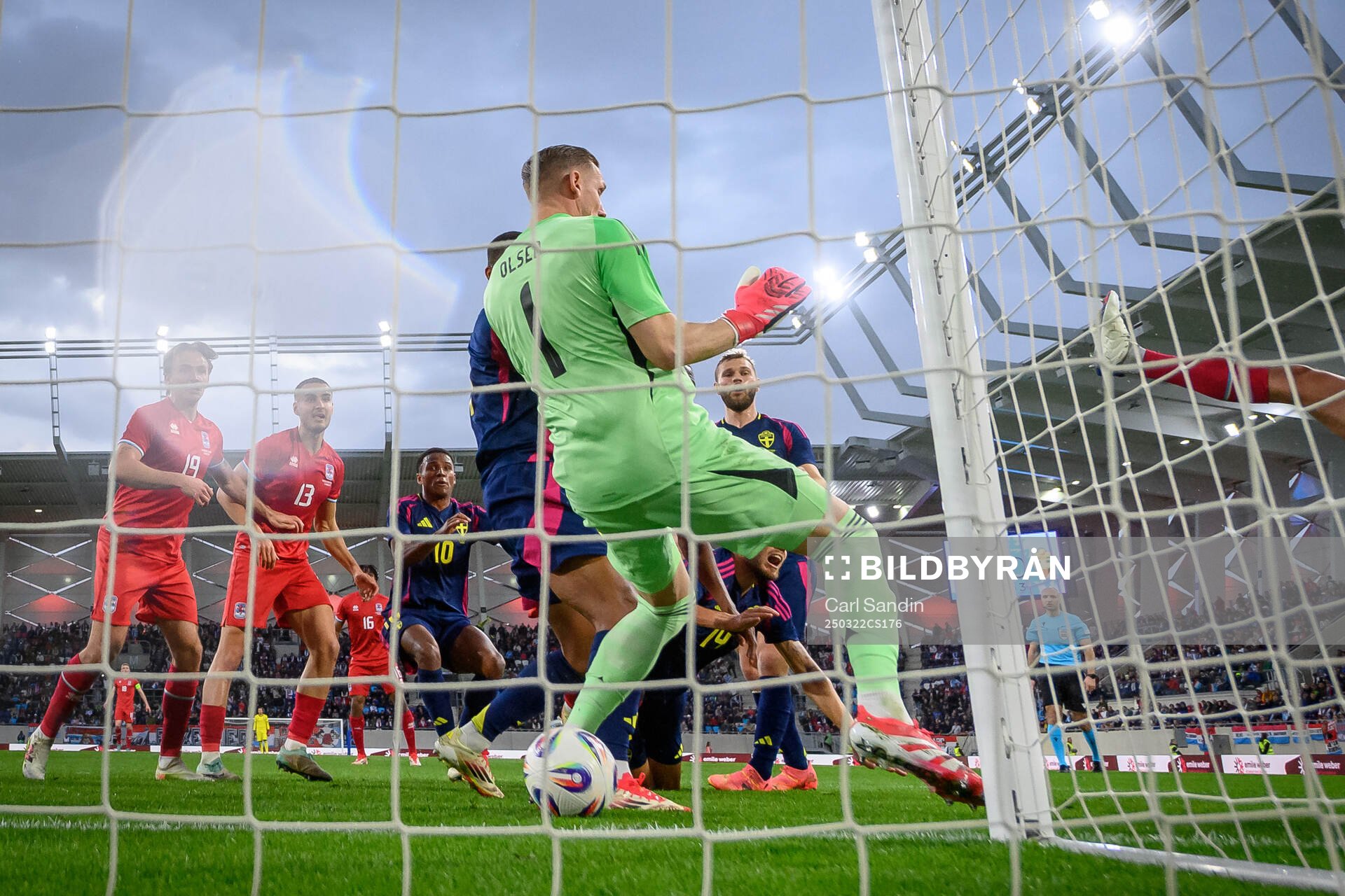Seid Korac of Luxembourg (not pictured) scores 1-0 behind