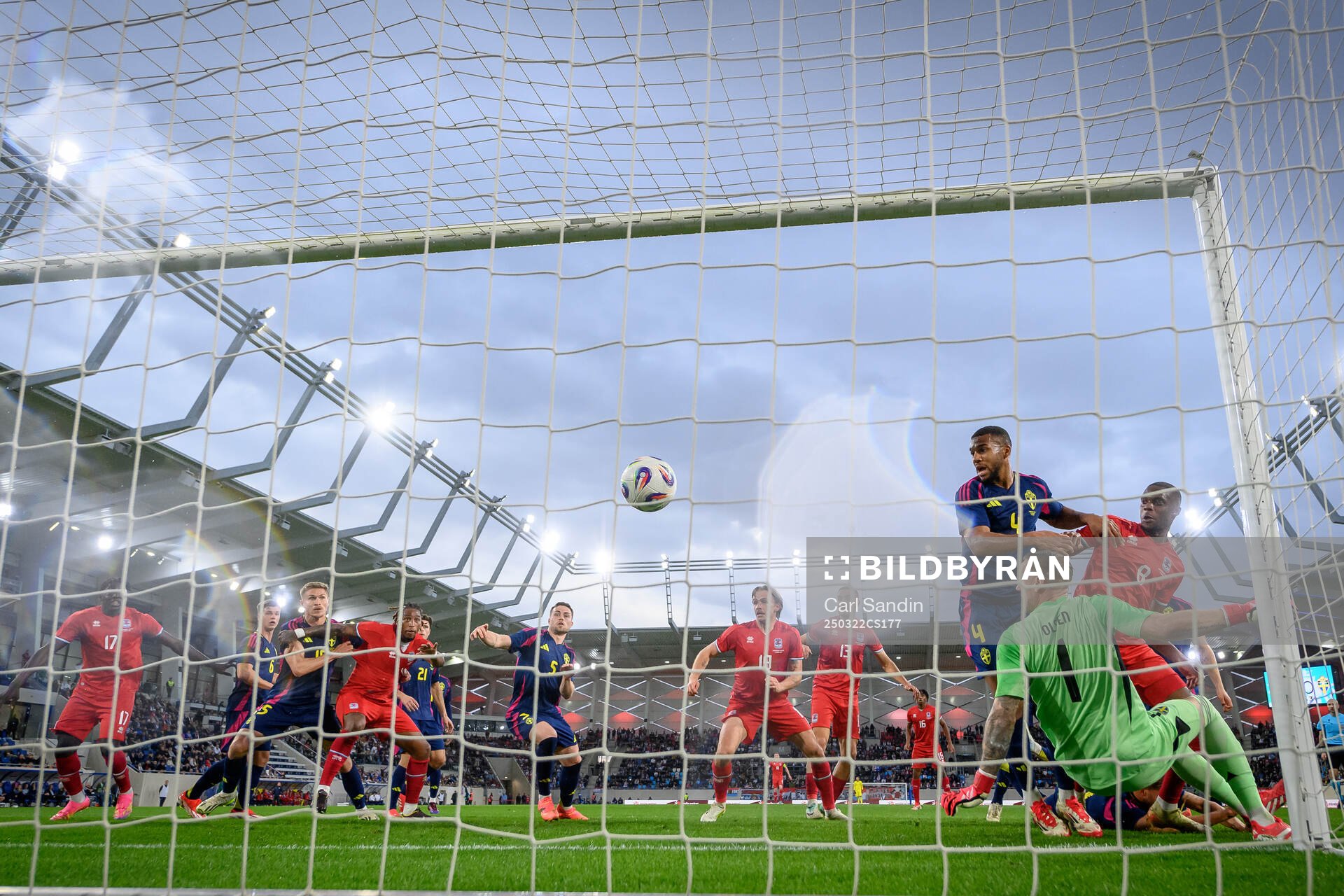 Seid Korac of Luxembourg (not pictured) scores 1-0 behind