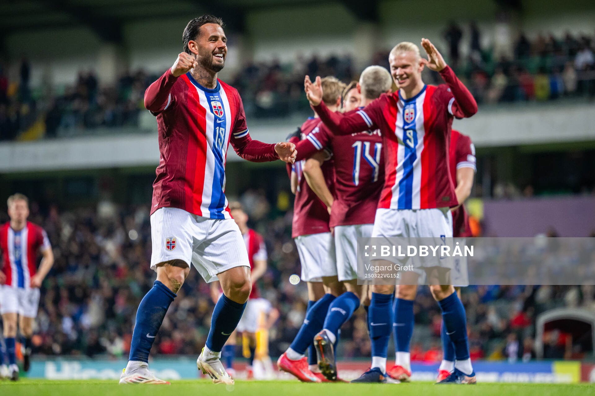 Aron Dønnum of Norway celebrates with teammate Erling