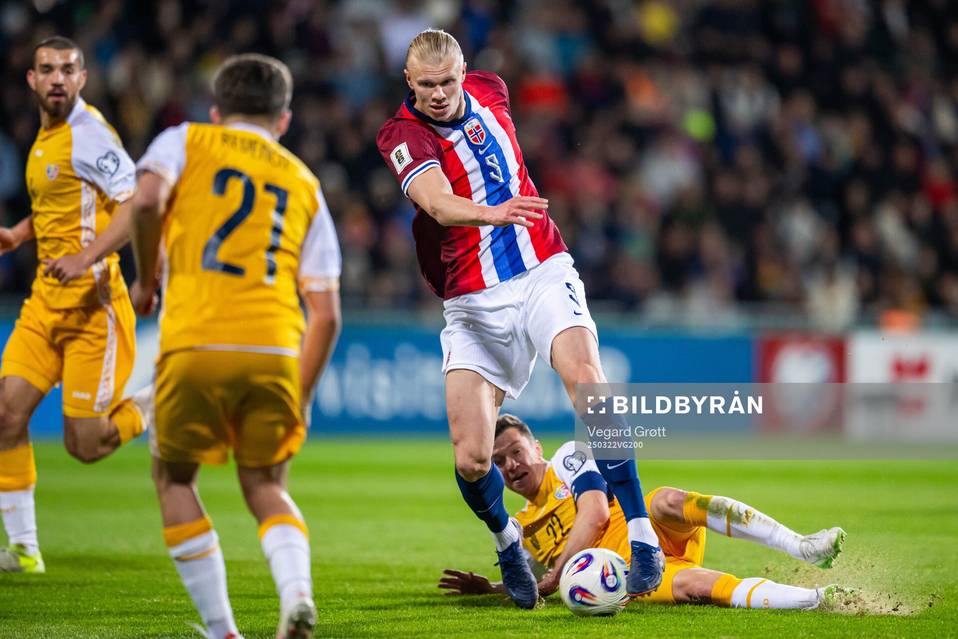 Erling Braut Haaland of Norway and Vadim Rata of Moldova