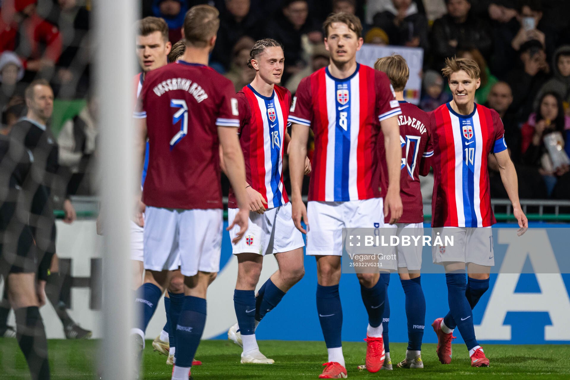 Thelo Aasgaard of Norway celebrates with teammates
