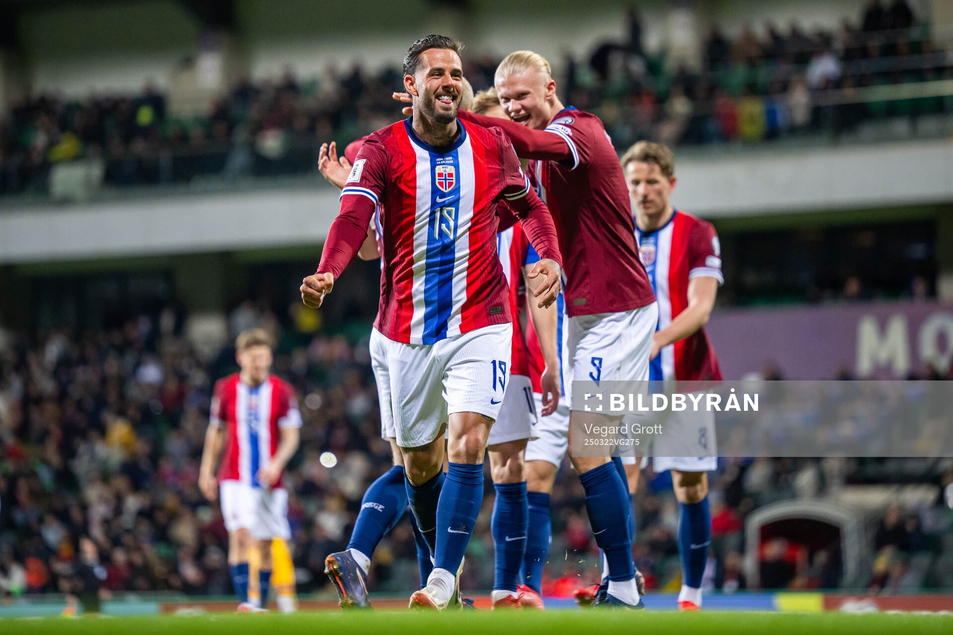 Aron Dønnum of Norway celebrates with teammate Erling