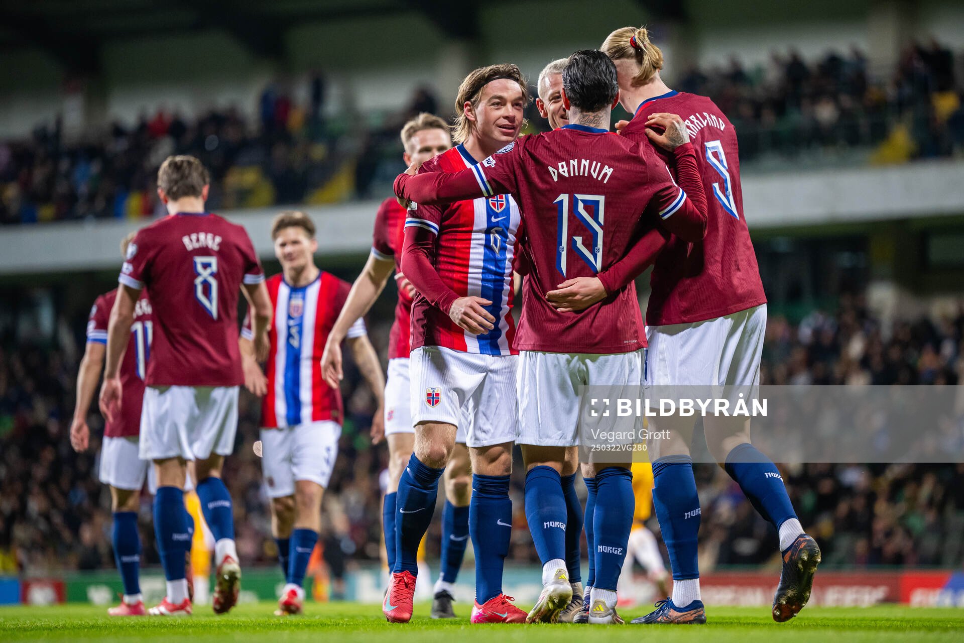 Aron Dønnum of Norway celebrates with Patrick Berg and