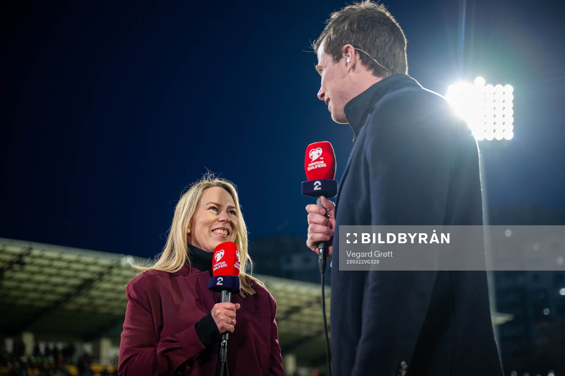 Anne Sturød and Jesper Mathisen of broadcaster TV 2 ahead of the FIFA World Cup Qualifier football match between Moldova and Norway on March 22, 2025 in Chisinau.