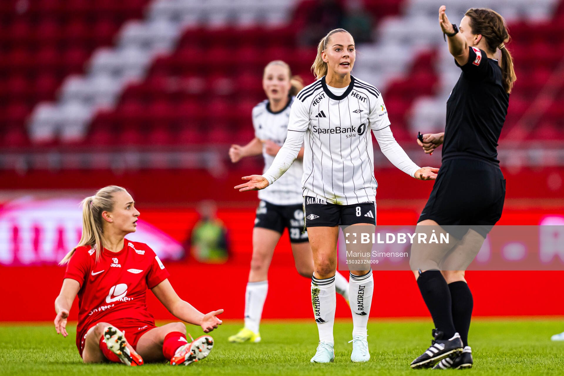 Lauren Alison Davidson of Brann and Agnes Birgitta Nyberg of Rosenborg reacts during the Toppserien football match between Brann and Rosenborg on March 23, 2025 in Bergen.