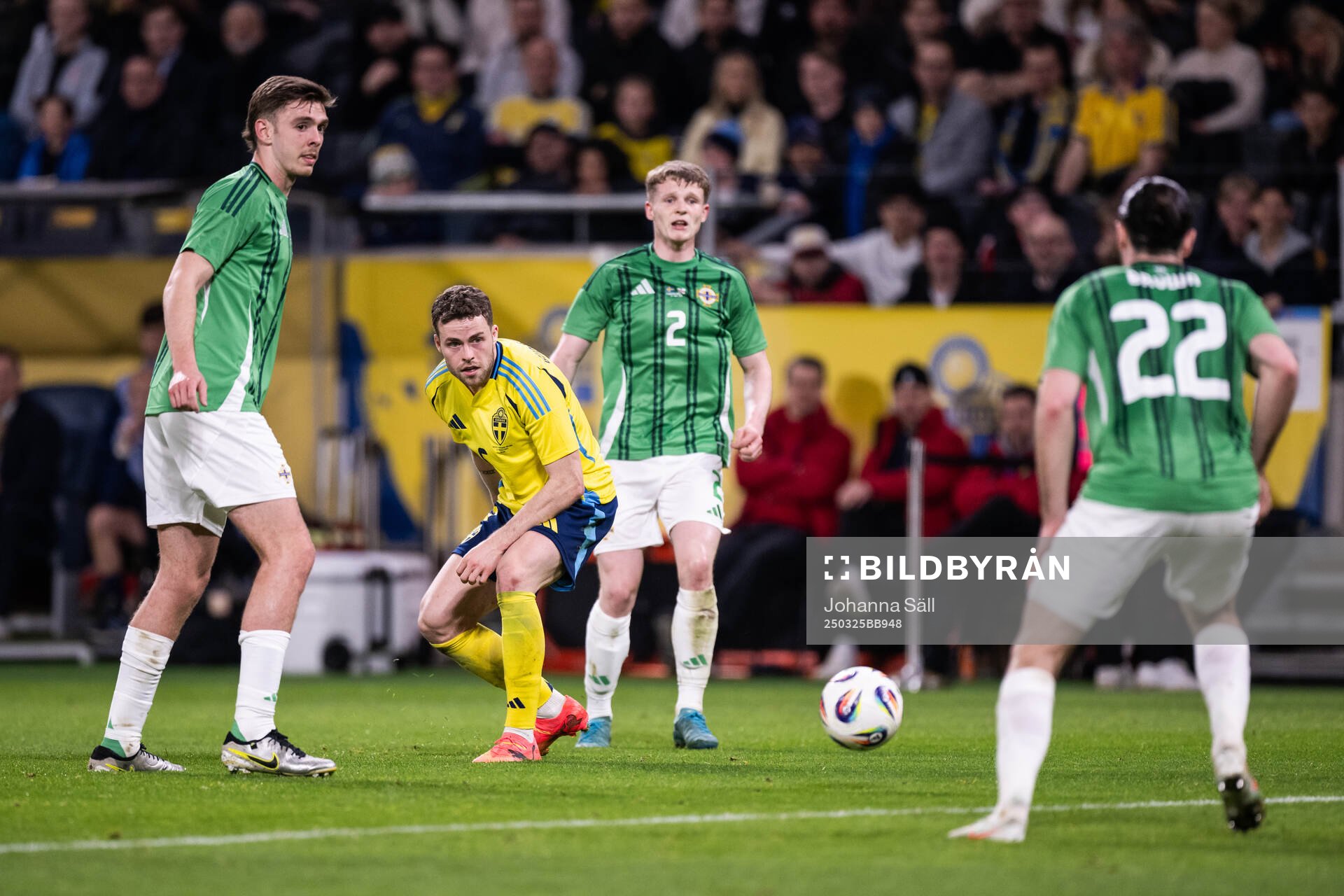 Gabriel Gudmundsson of Sweden and Terry Devlin of Northern Ireland during the international friendly football match between Sweden and Northern Ireland on March 25, 2025 in Stockholm.