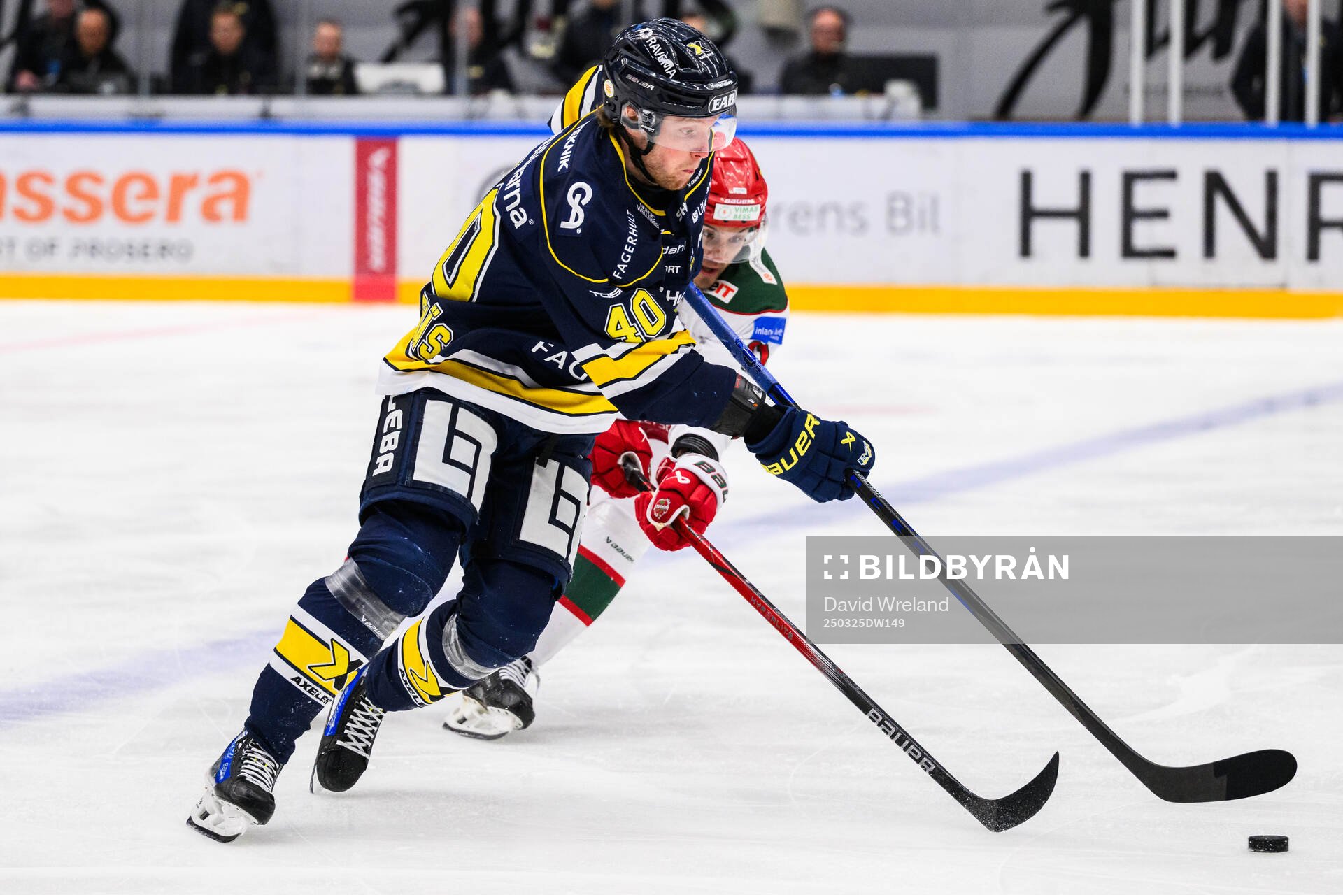 HV71s Oskar Stål-Lyrenäs och Modos Alexander True