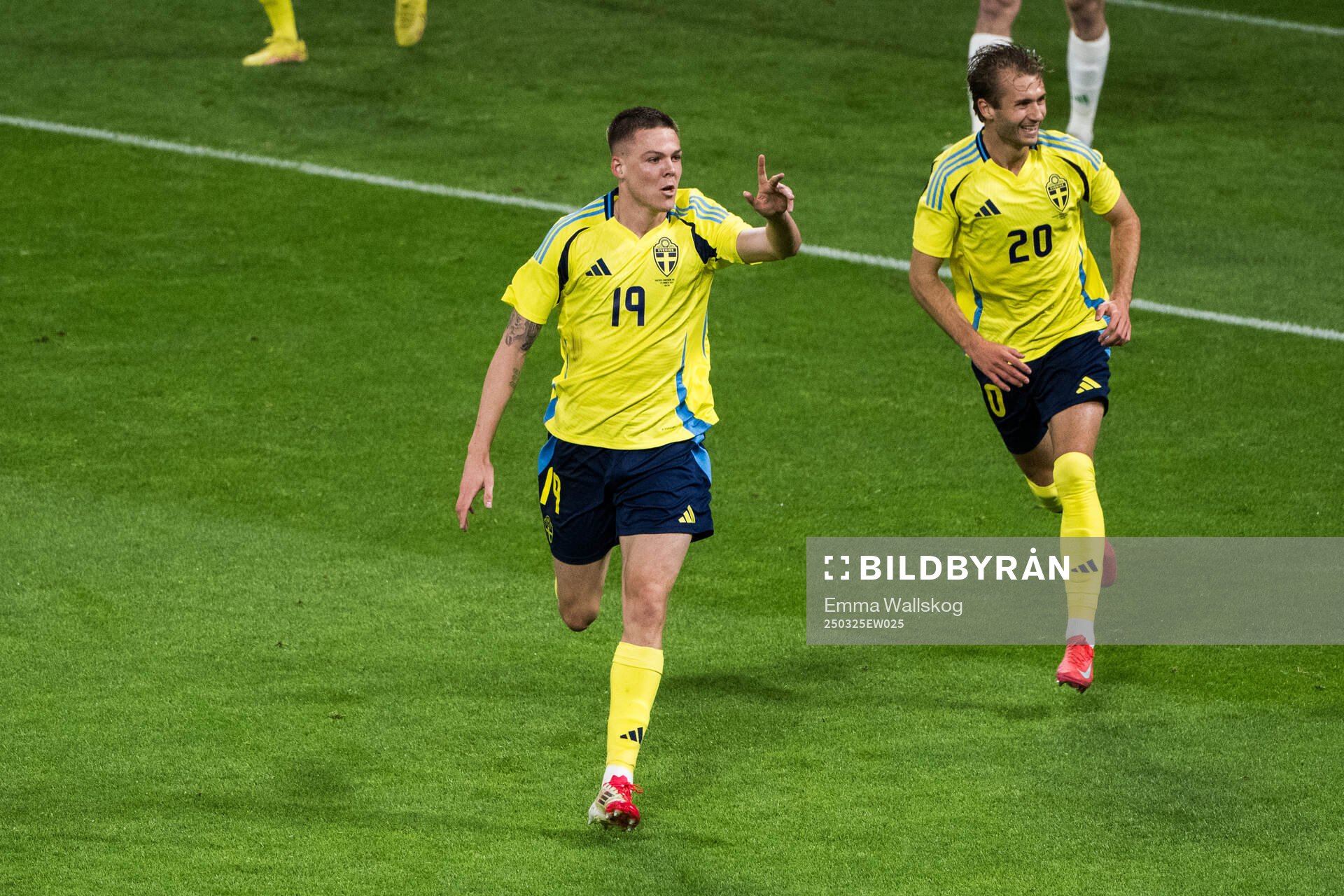 Emil Holm and Benjamin Nygren of Sweden celebrating the 1-0