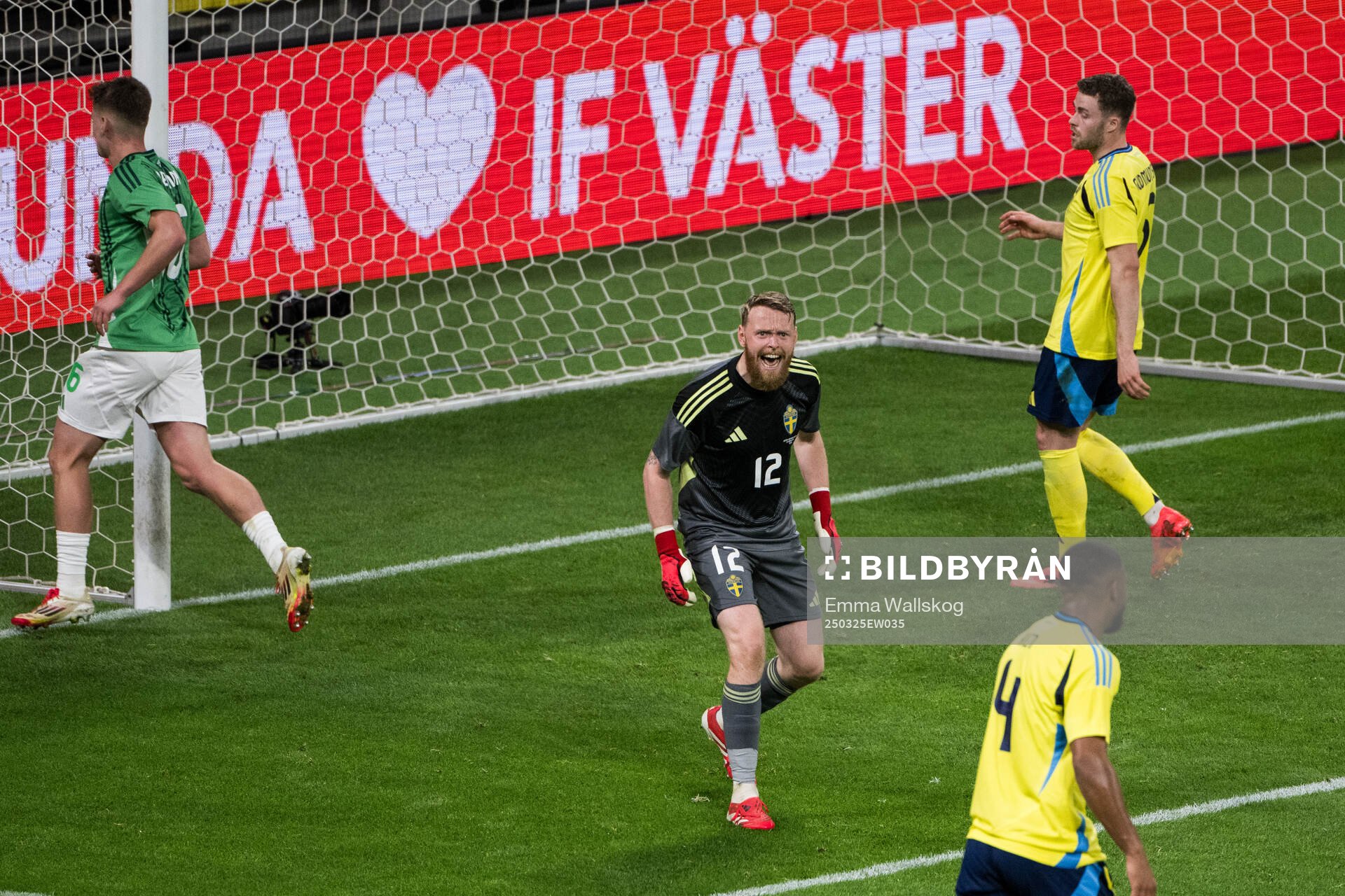 Goalkeeper Viktor Johansson and Isak Hien of Sweden