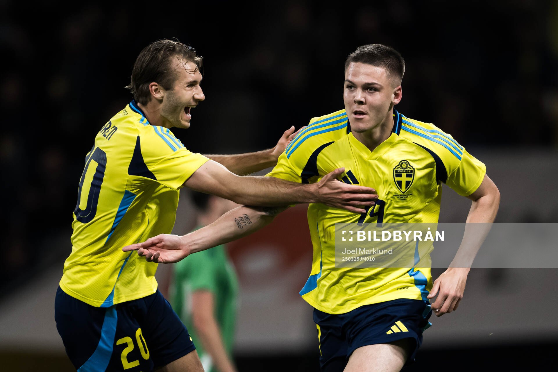 Benjamin Nygren and Emil Holm of Sweden celebrating scoring