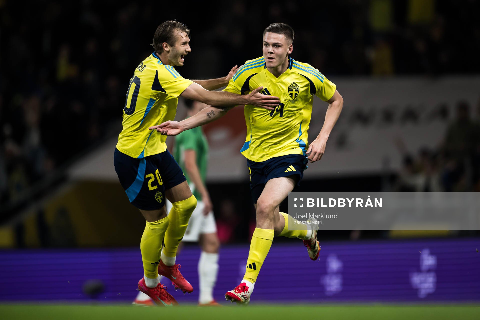 Benjamin Nygren and Emil Holm of Sweden celebrating scoring