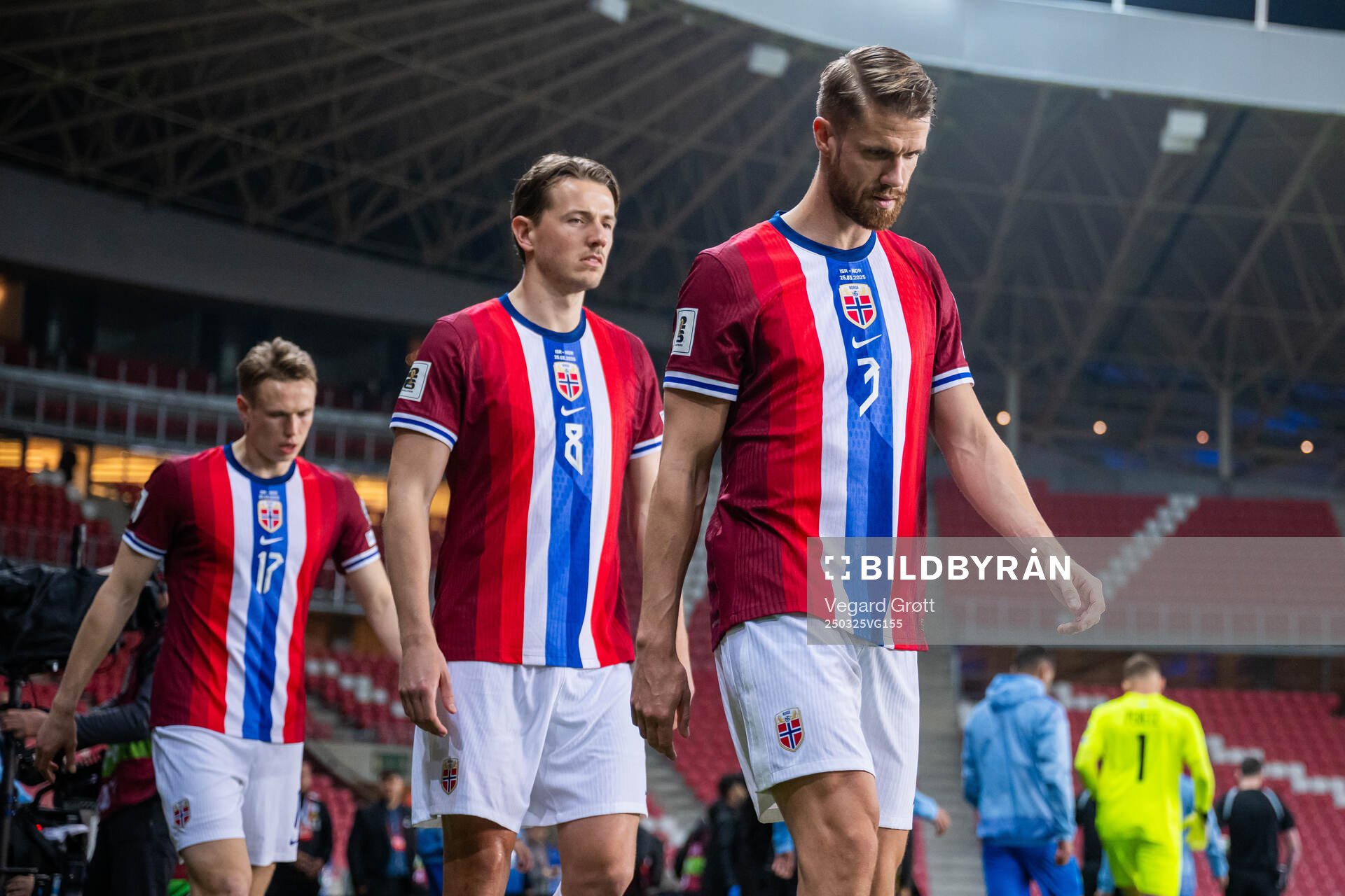 Sander Berge and Kristoffer Ajer of Norway enter the pitch