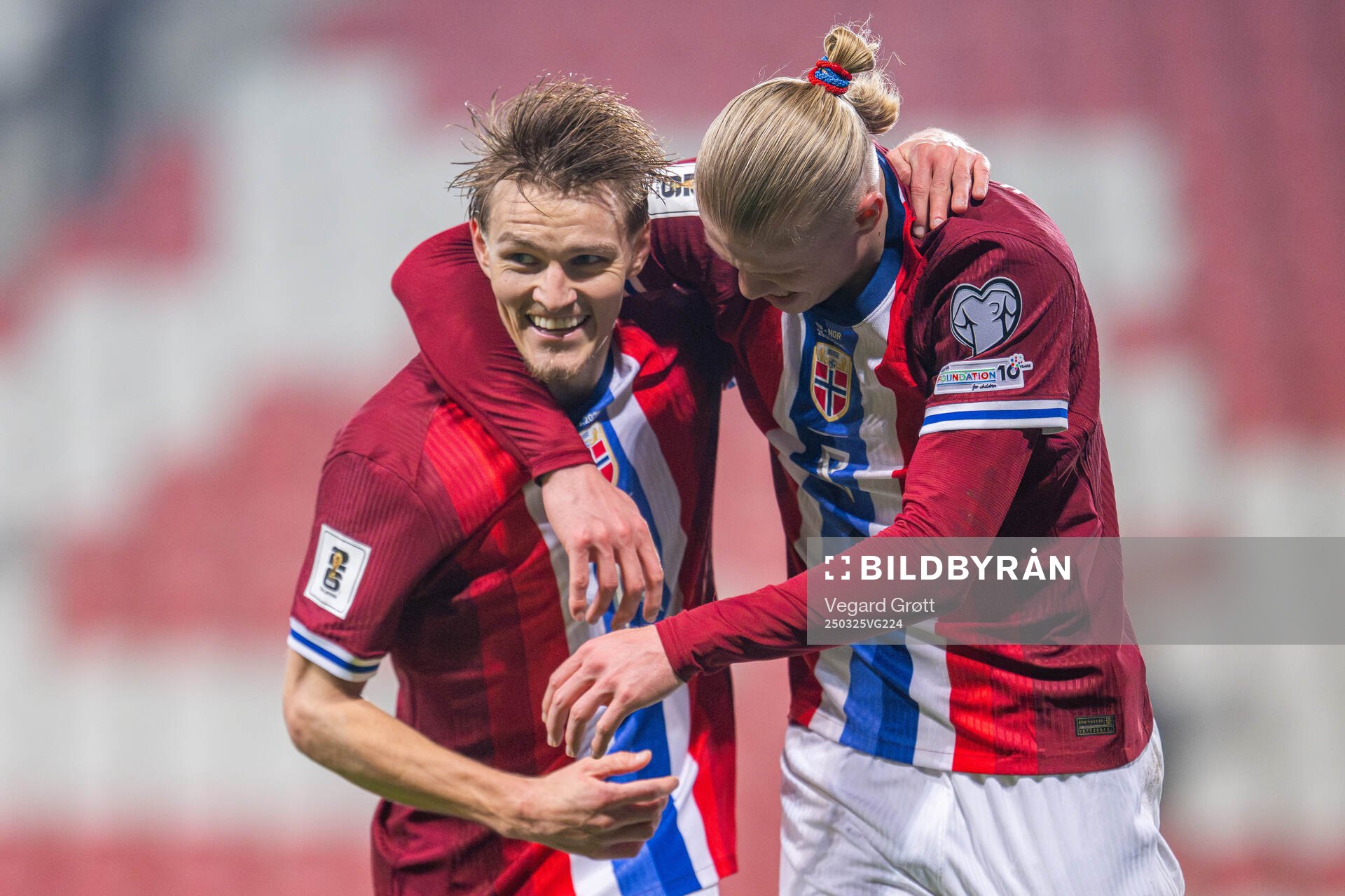 Erling Braut Haaland of Norway celebrates with teammate