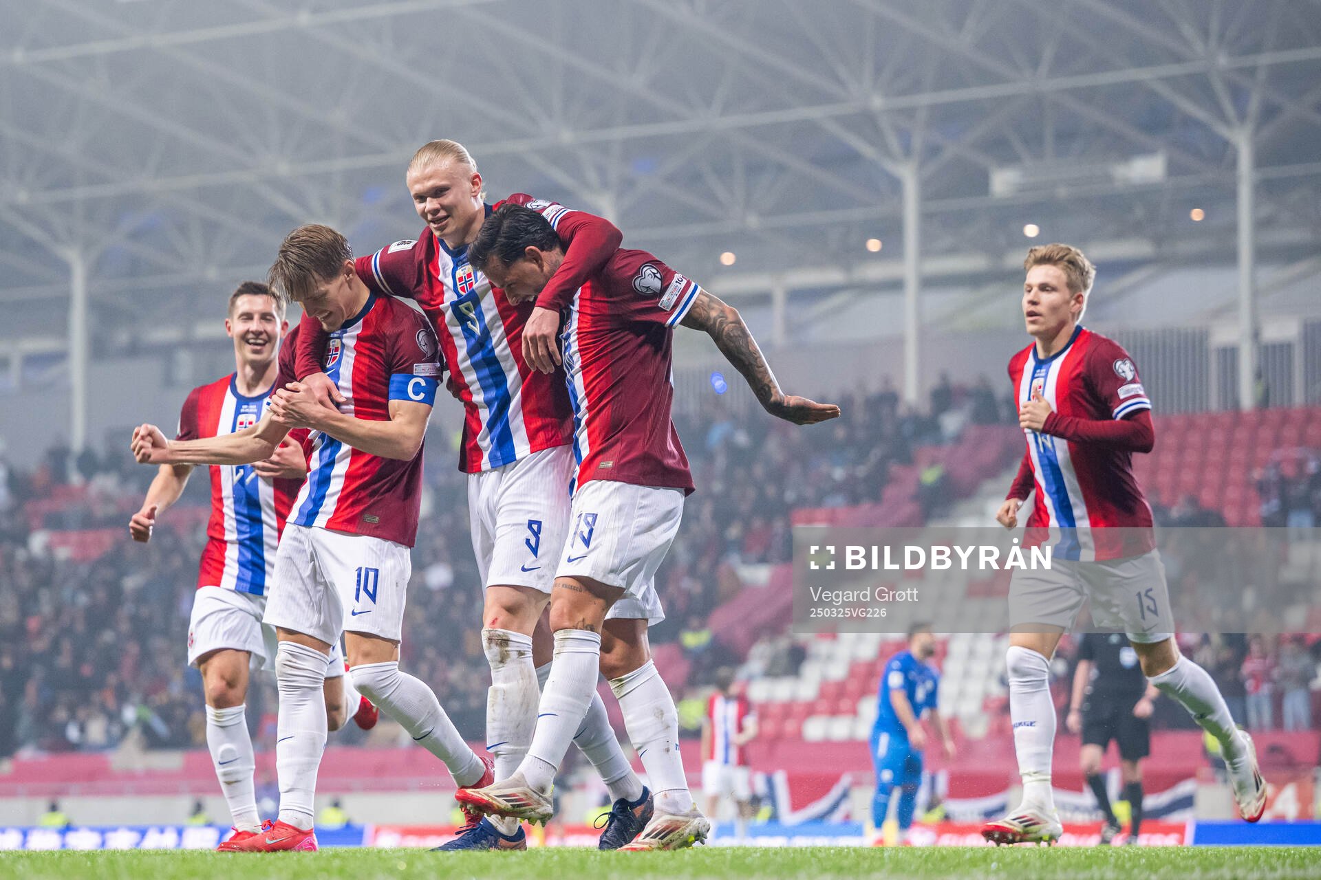 Erling Braut Haaland of Norway celebrates with teammates