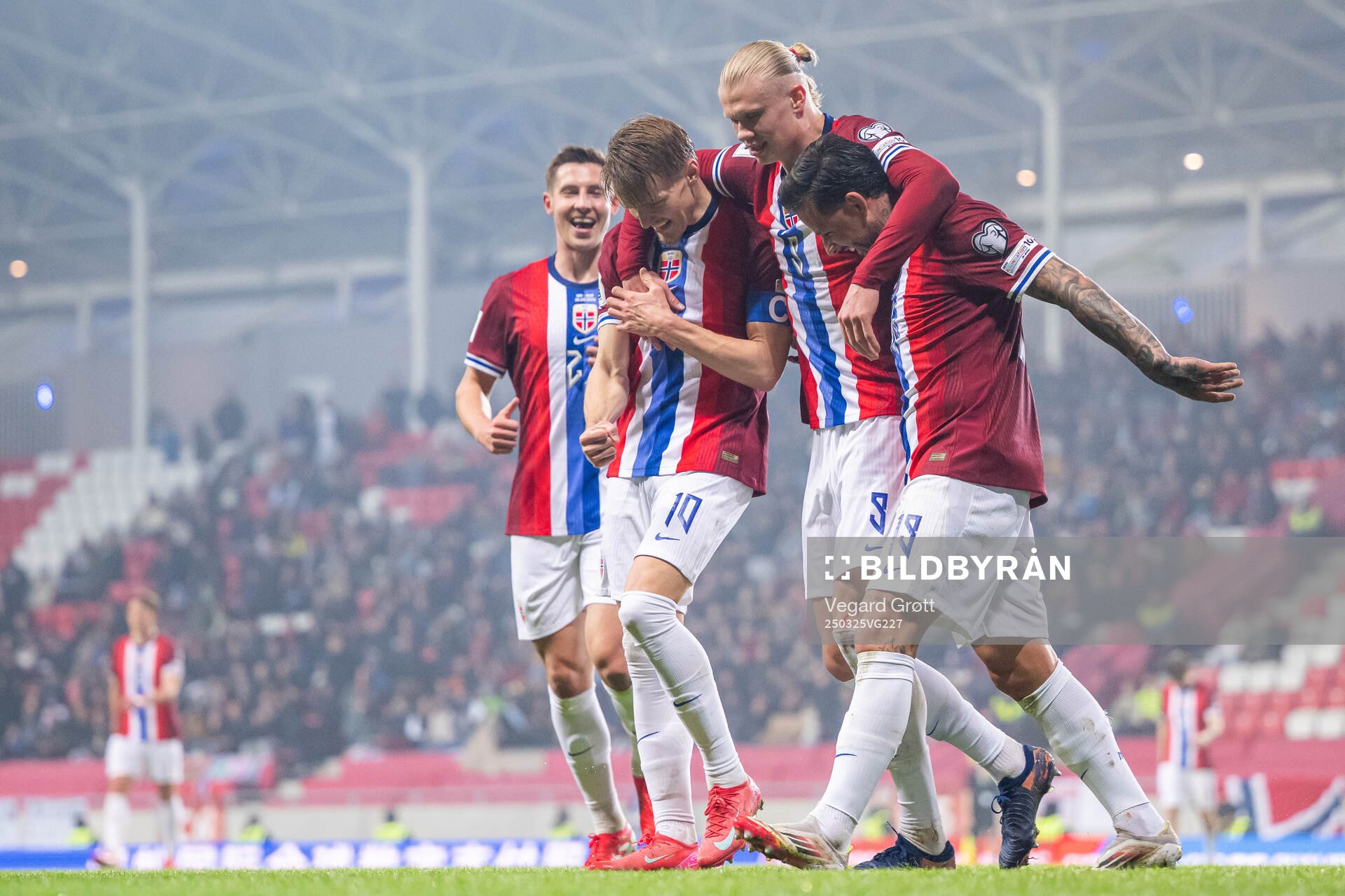 Erling Braut Haaland of Norway celebrates with teammates