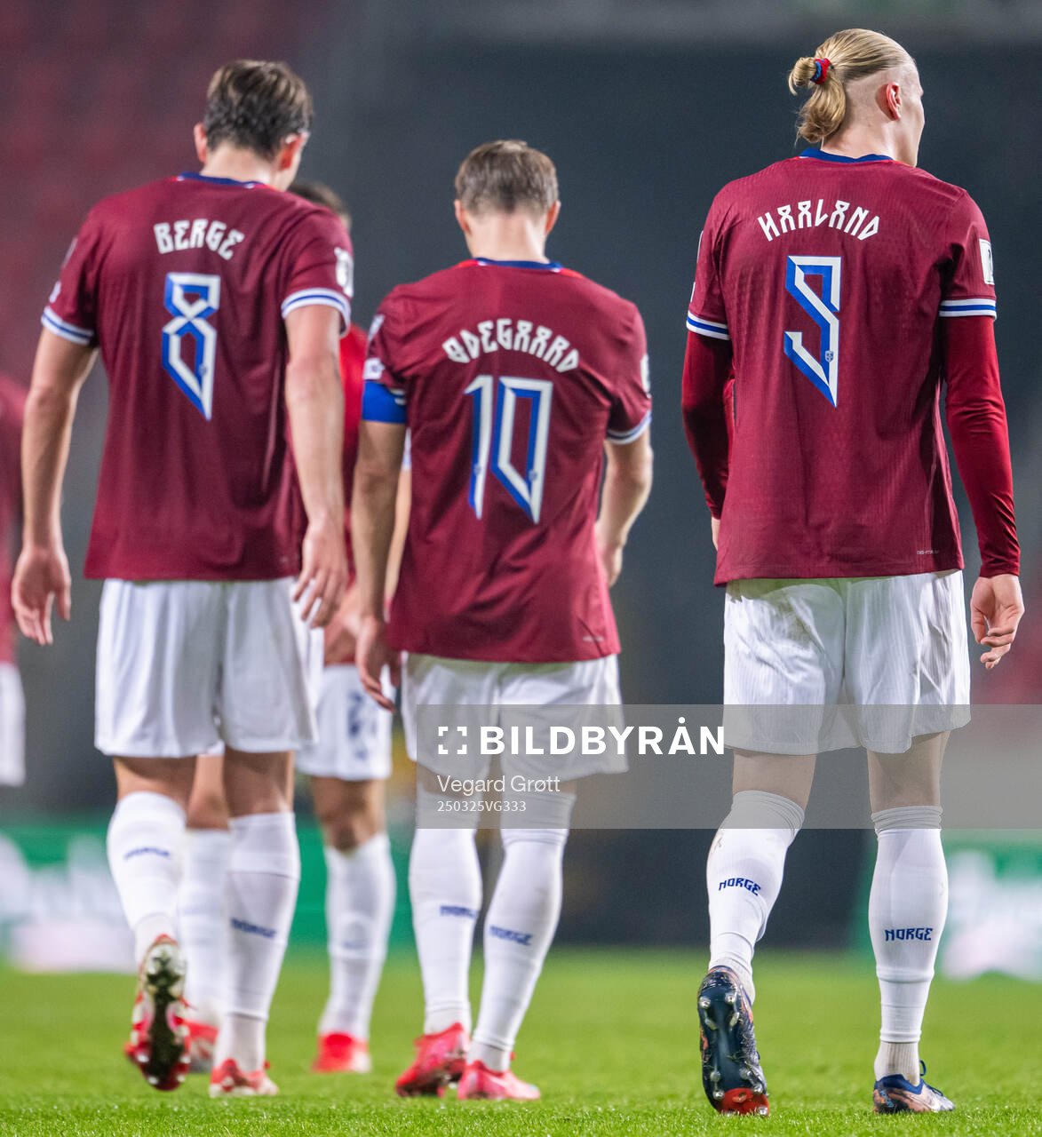 Erling Braut Haaland of Norway with teammates Sander Berge