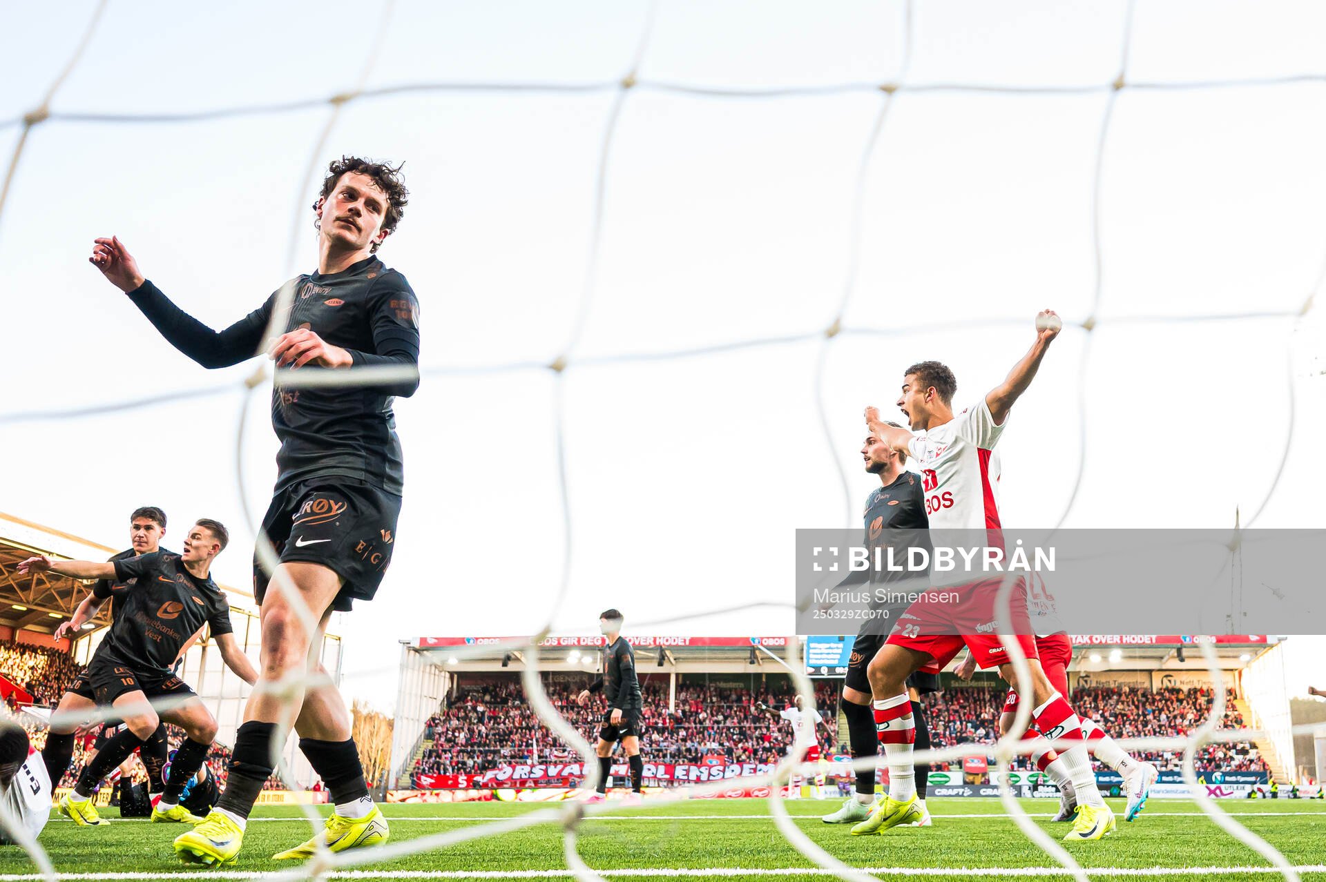 Denzel De Roeve of Brann looks dejected while Henrik