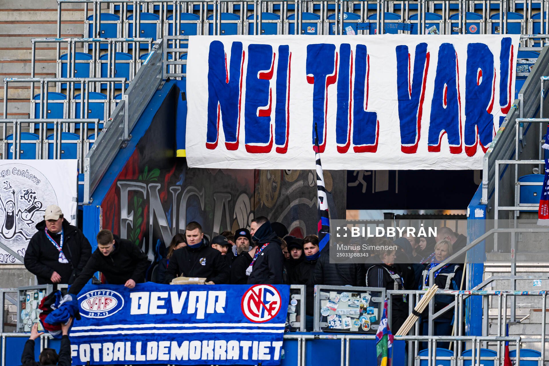 VAR banner and supporters