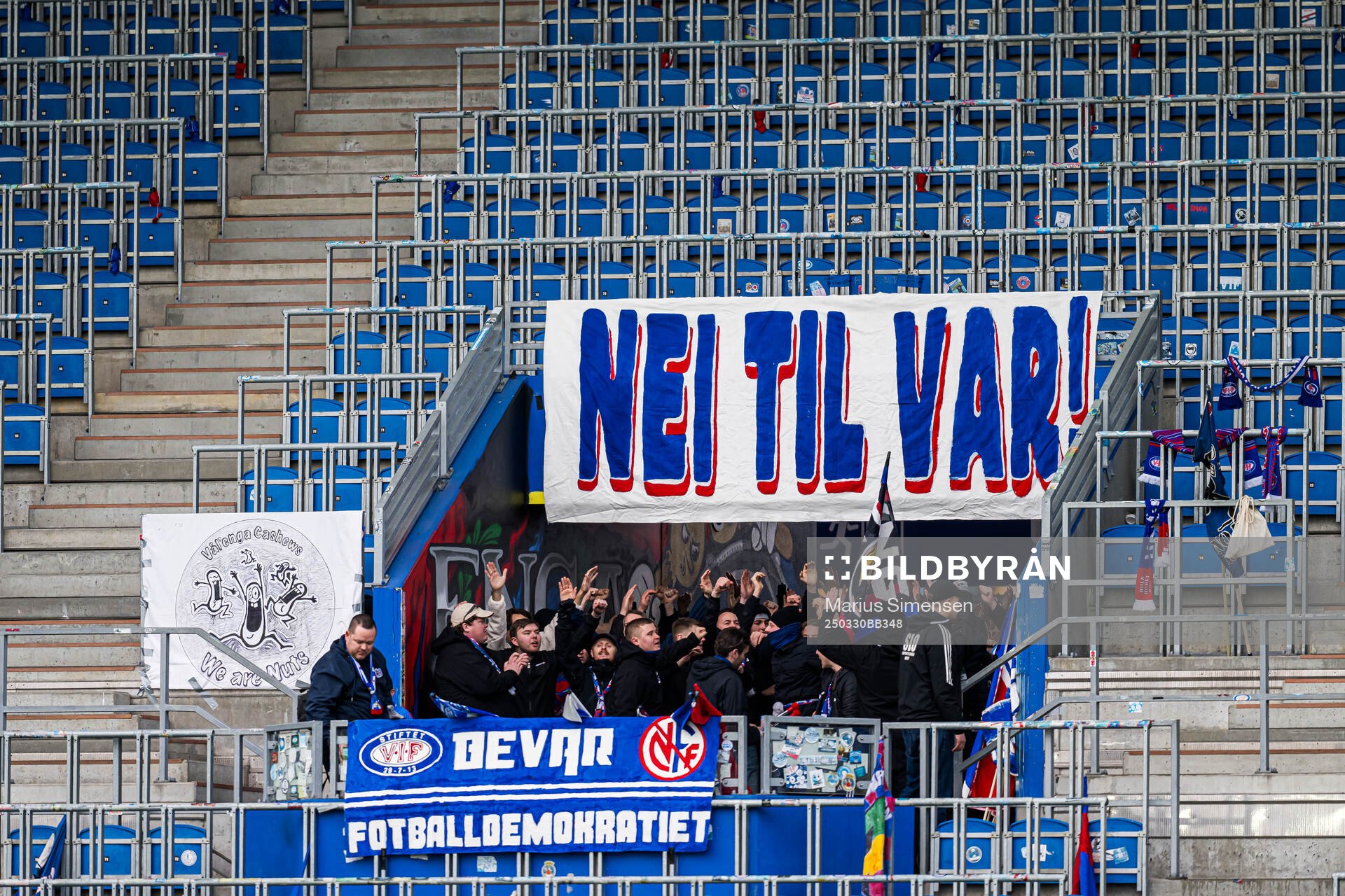 VAR banner and supporters