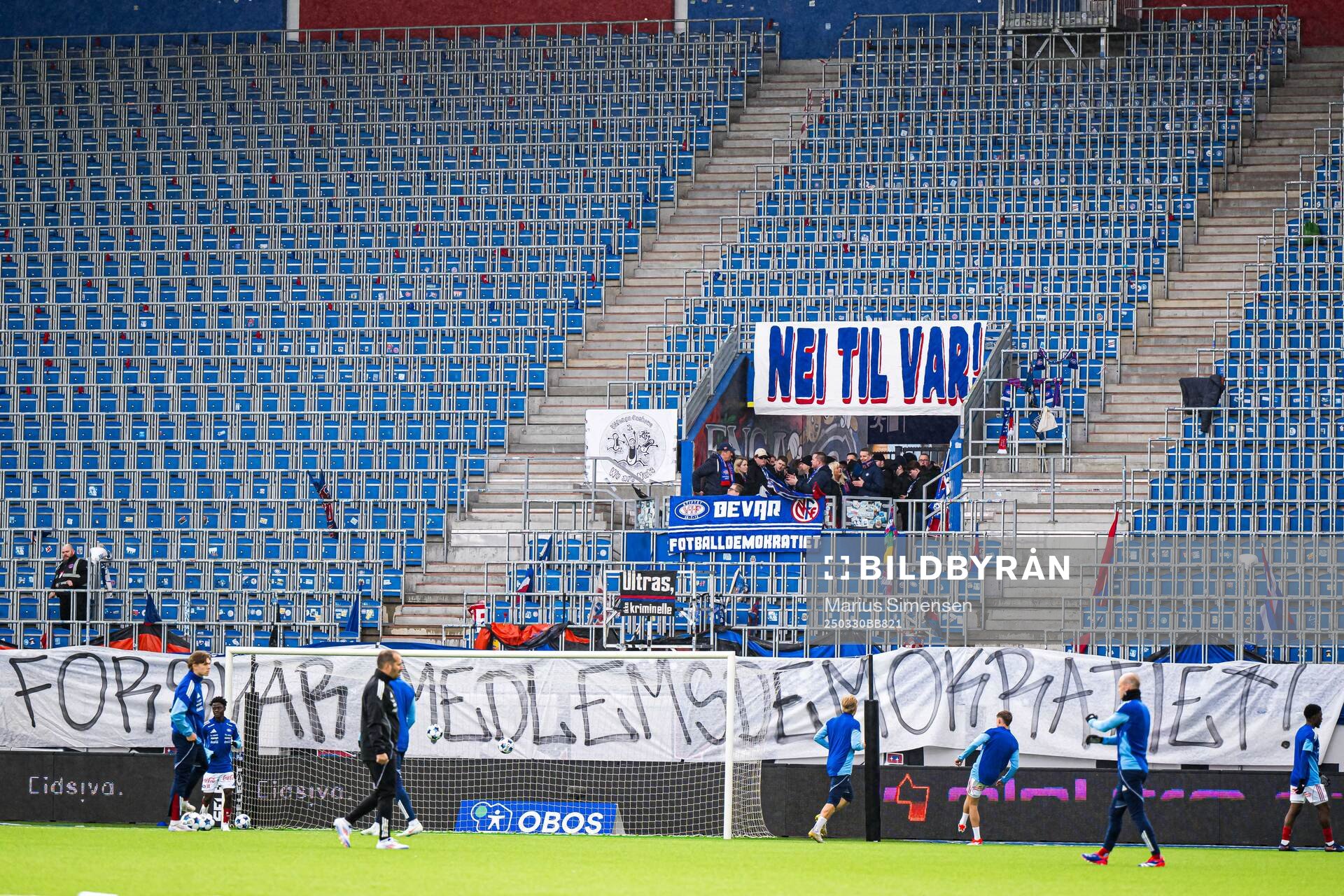 VAR banner and supporters