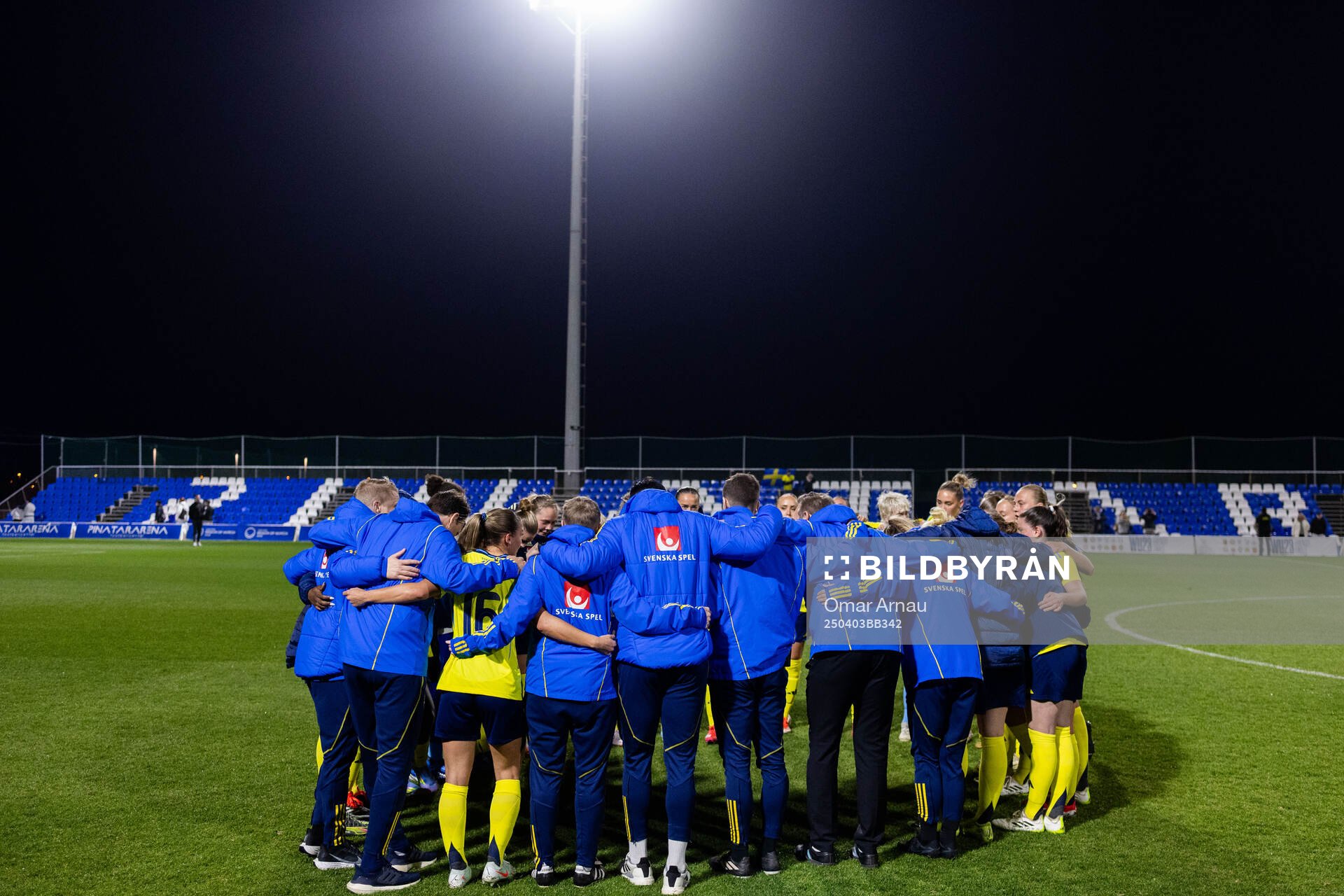 Players and staff of Sweden gather