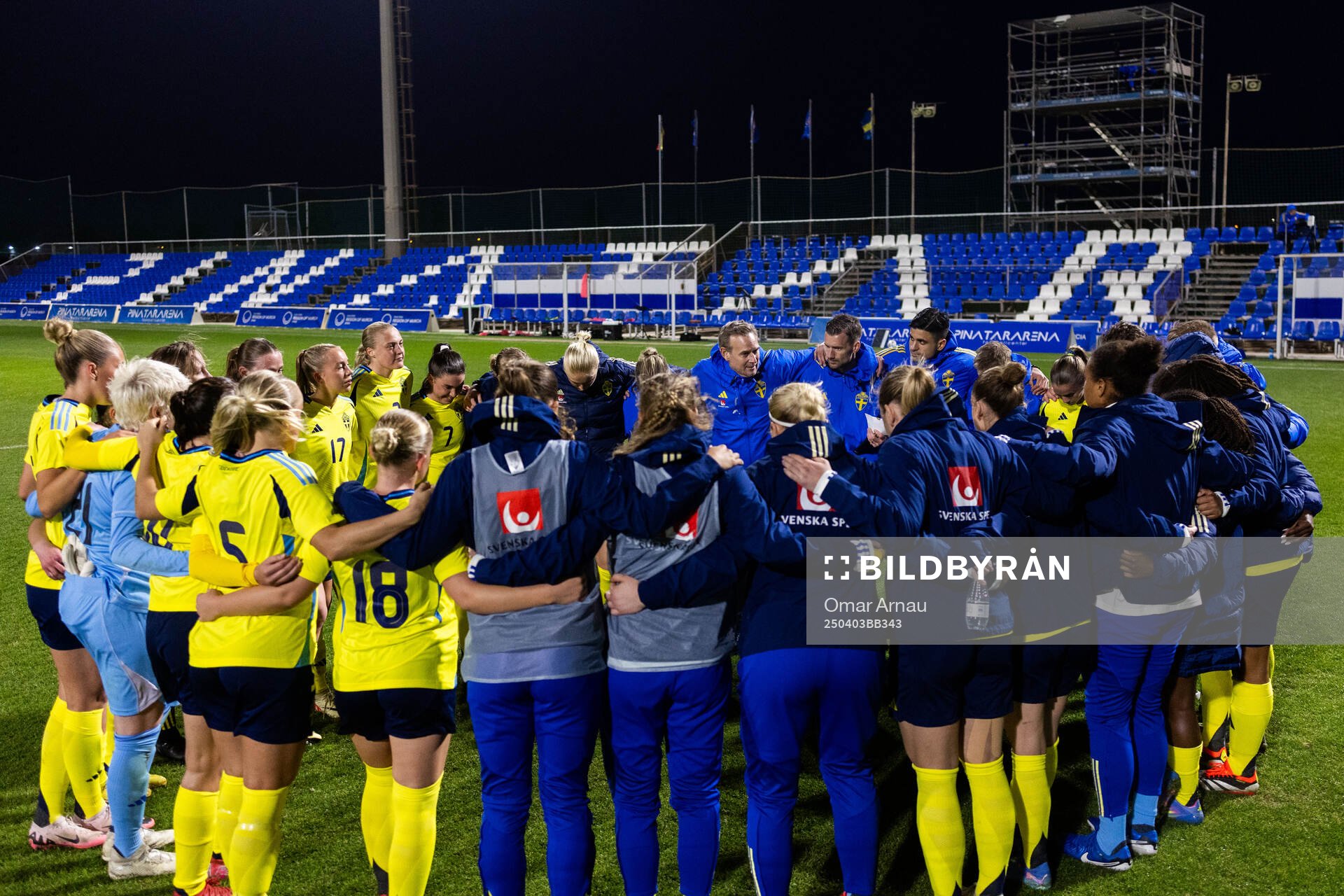 Players and staff of Sweden gather