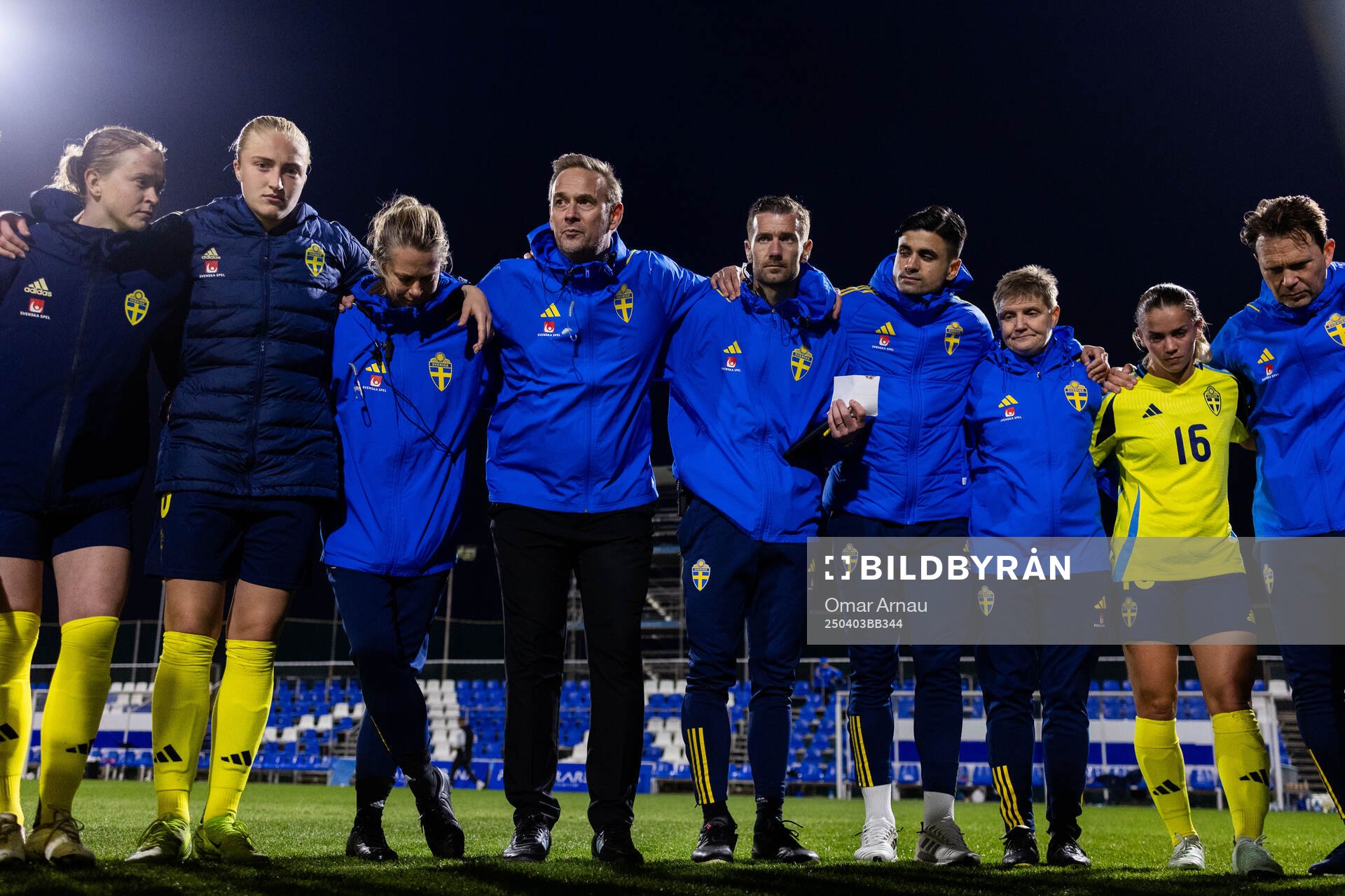 Players and staff of Sweden gather