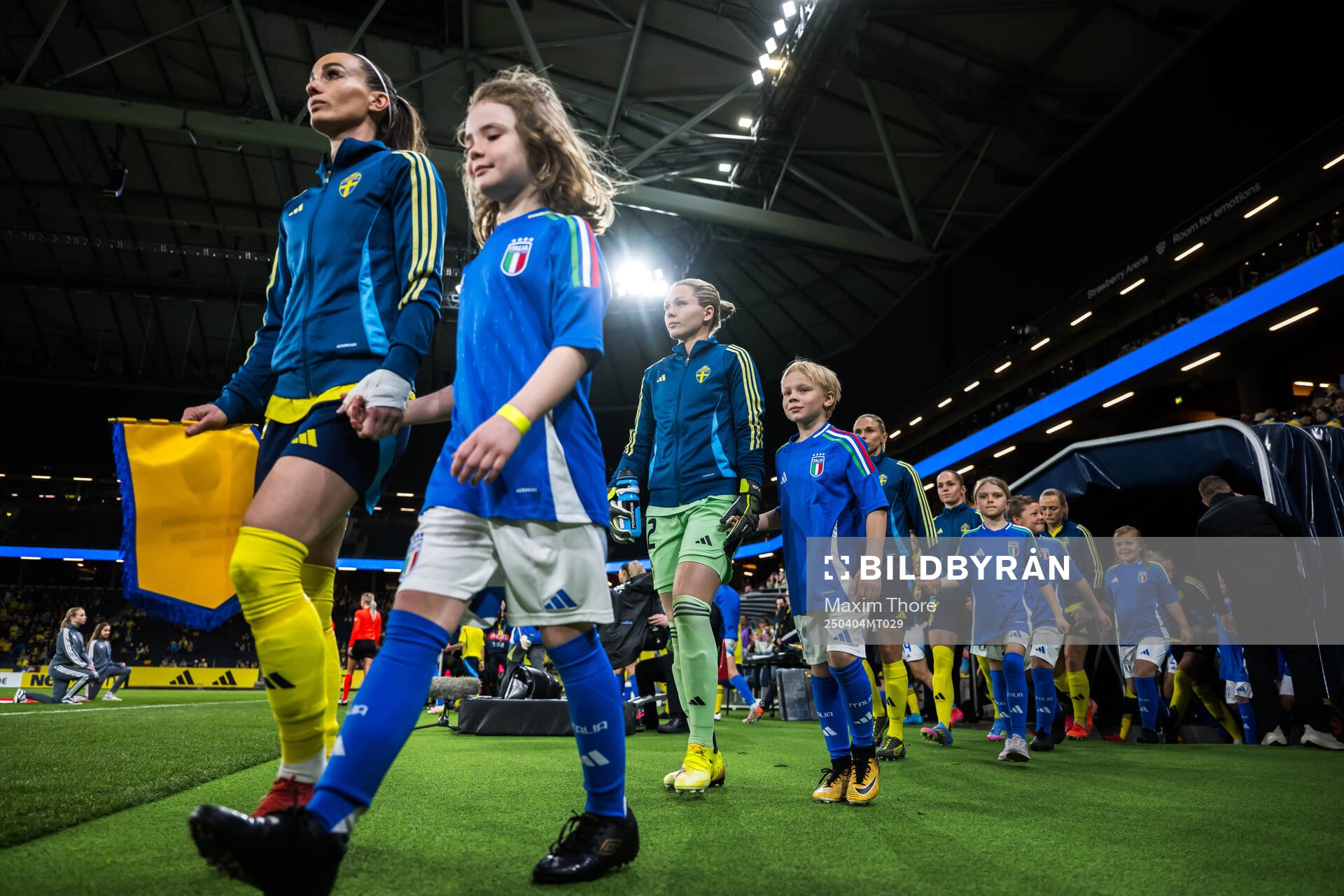 Kosovare Asllani and goalkeeper Jennifer Falk of Sweden