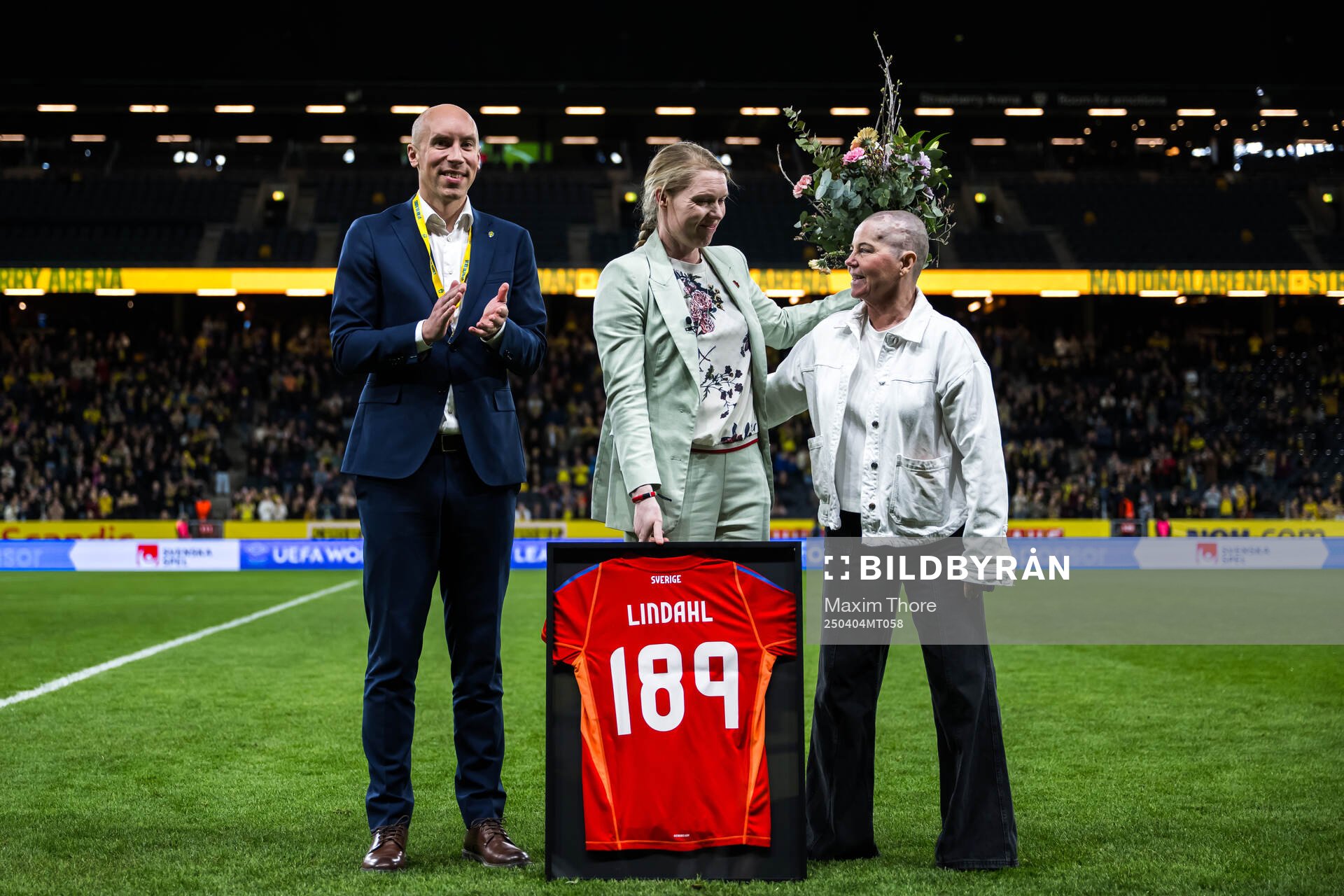 Simon Åström, president of the Swedish Football Association, and Marika Domanski Lyfors as former national team goalkeeper Hedvig Lindahl is celebrated during the UEFA Women's Nations League football match between Sweden and Italy on April 4, 2025 in Stockholm.