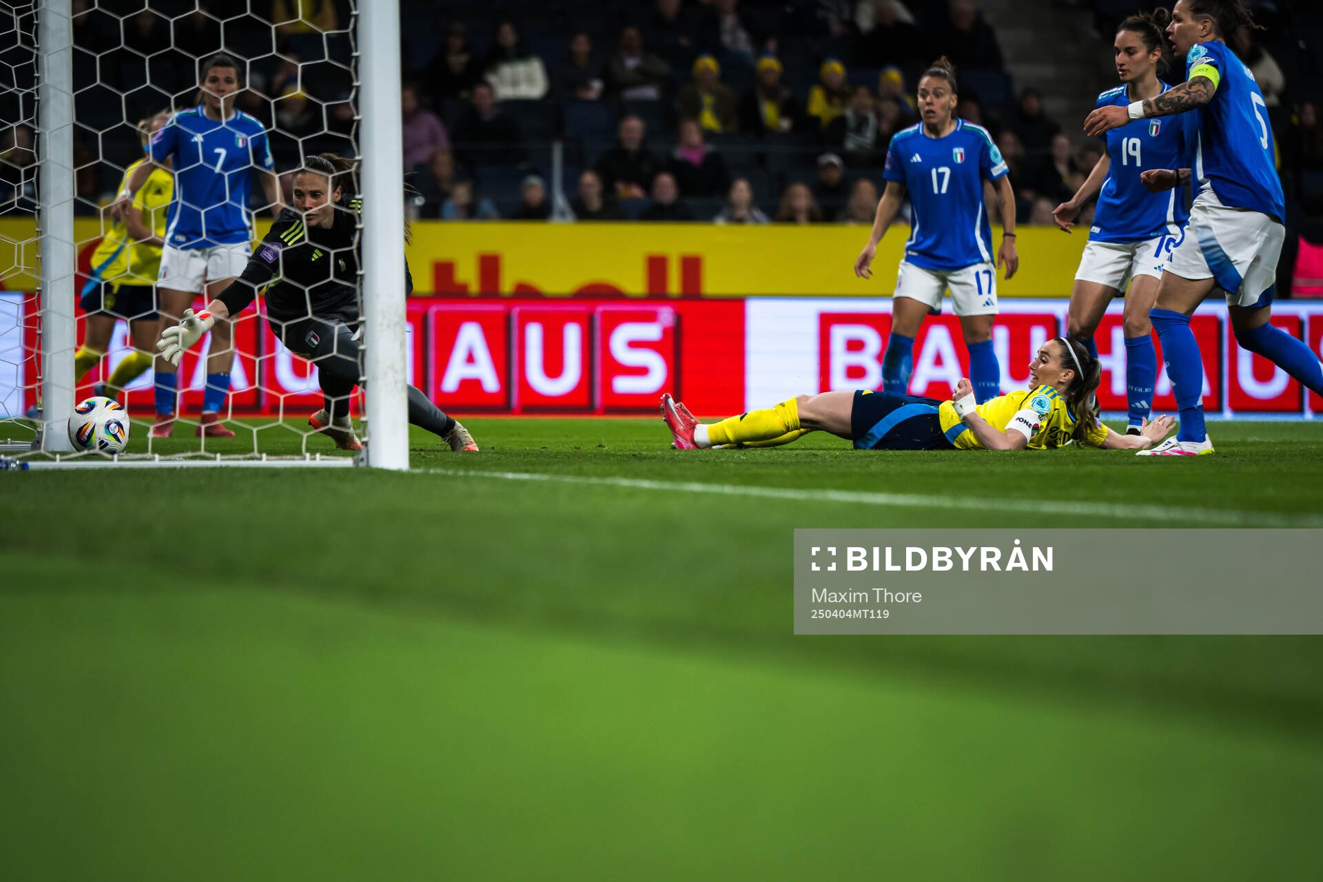 Kosovare Asllani of Sweden scores 1-1 behind goalkeeper