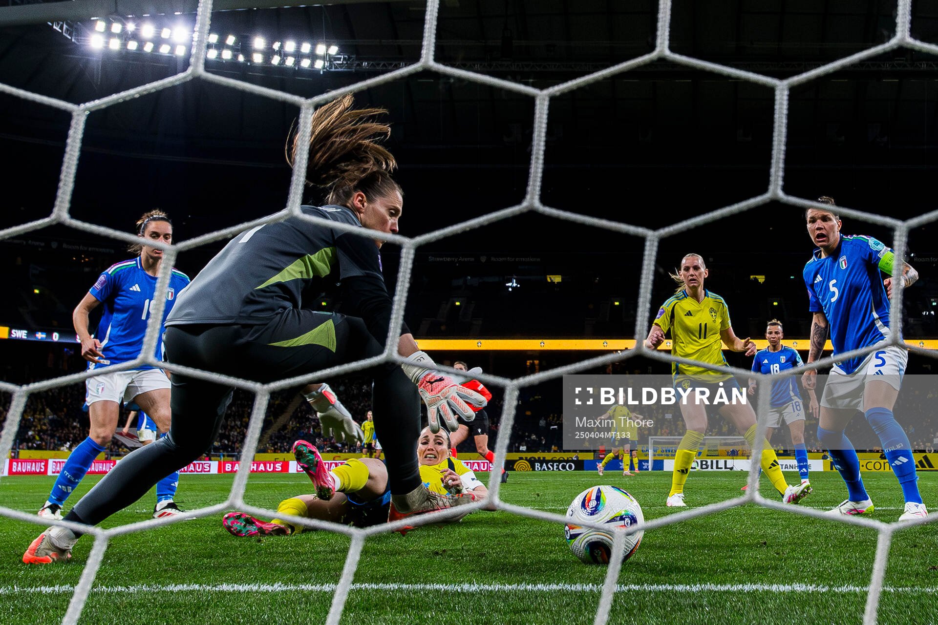 Kosovare Asllani of Sweden scores the 1-1 goal behind