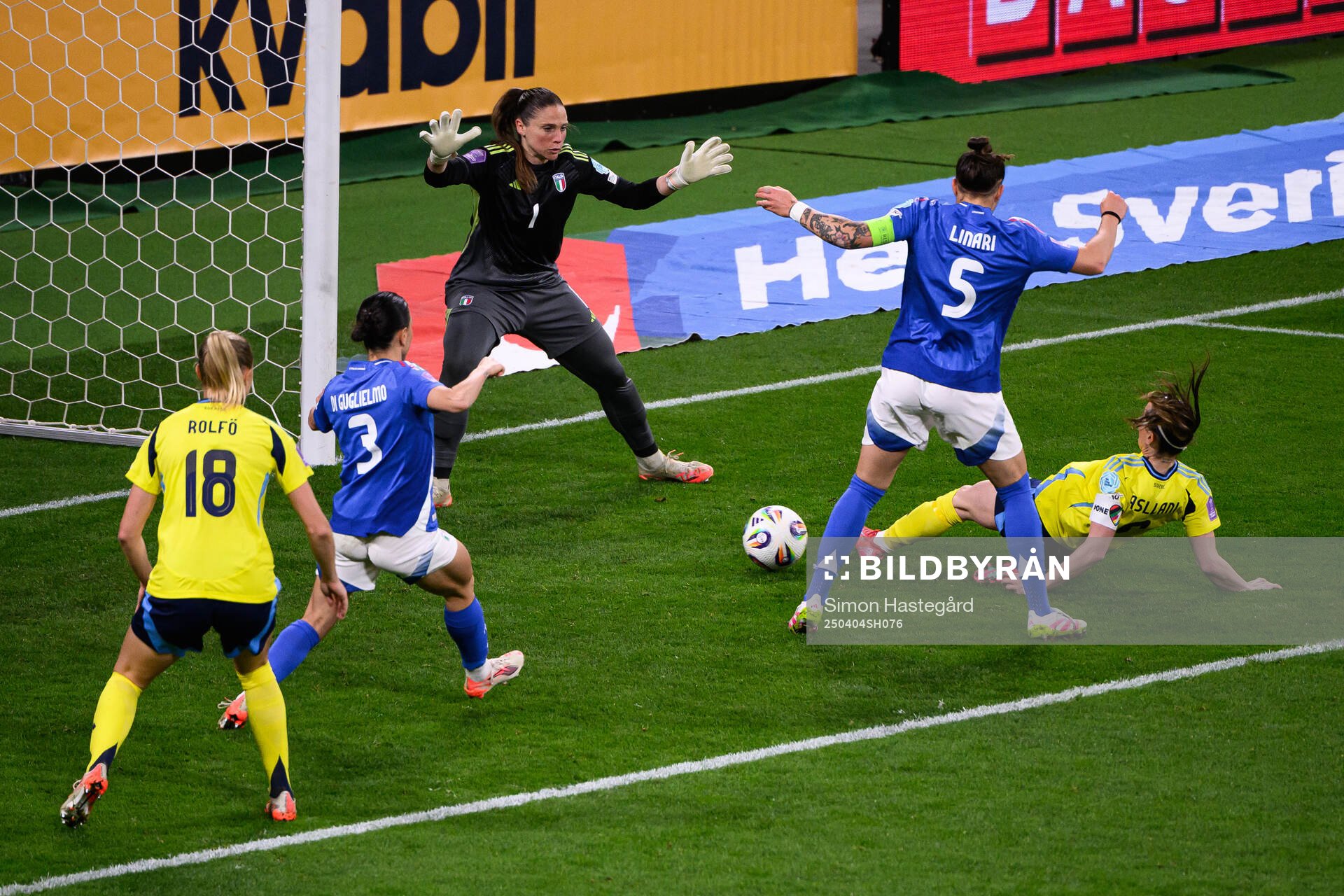 Kosovare Asllani of Sweden scores 1-1 behind goalkeeper