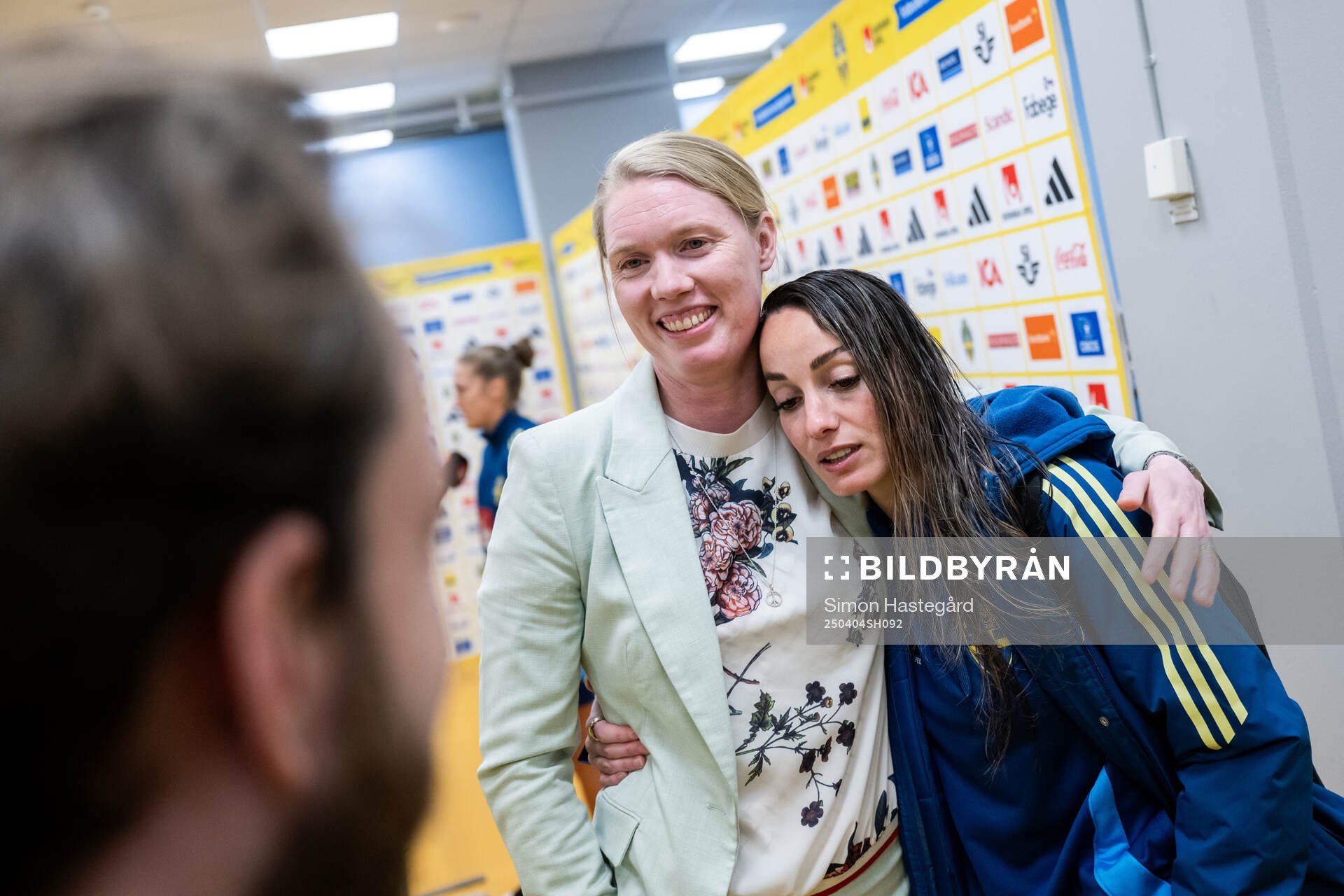 Former goalkeeper Hedvig Lindahl with Kosovare Asllani of Sweden in the mixed zone after the UEFA Women's Nations League football match between Sweden and Italy on April 4, 2025 in Stockholm.