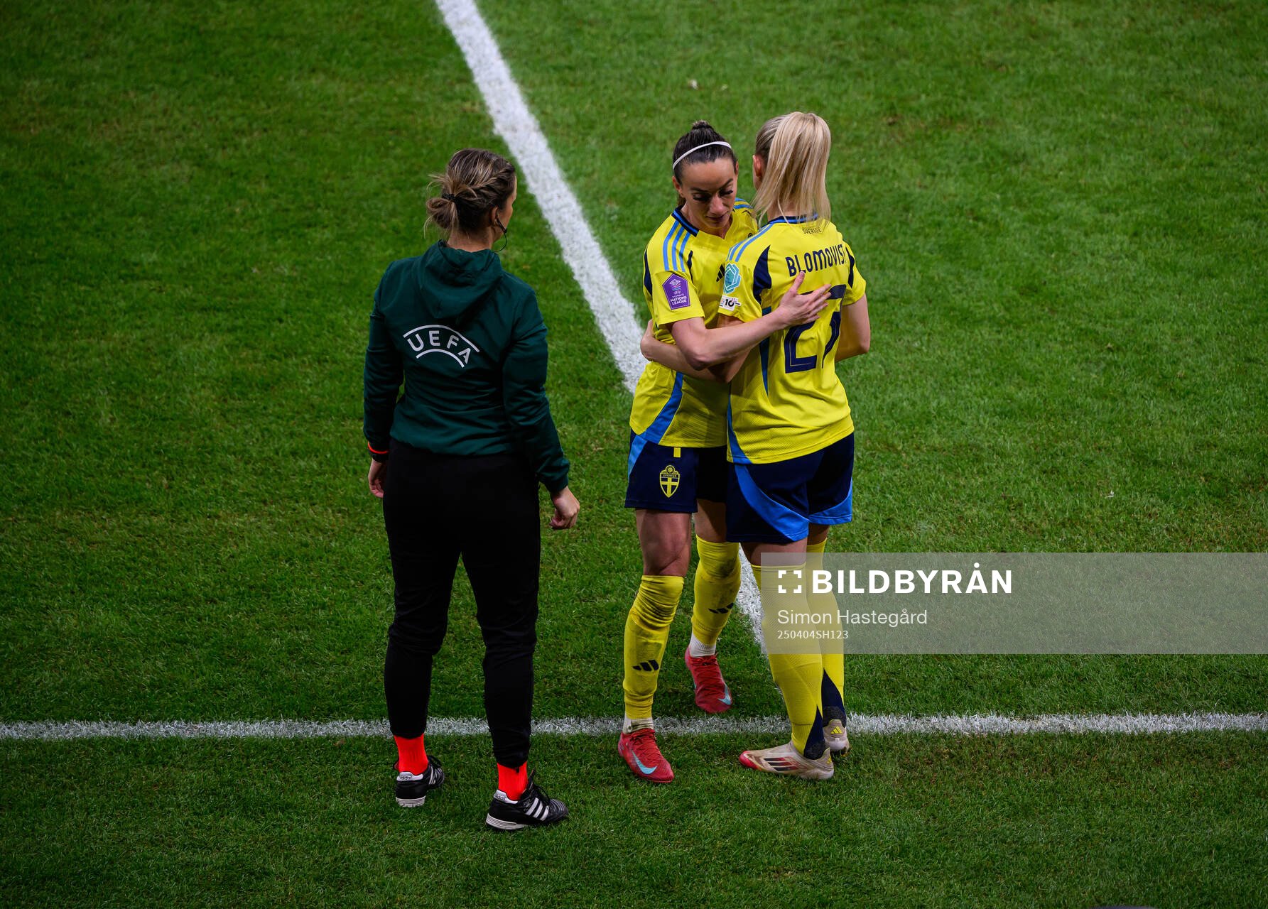 Kosovare Asllani and Rebecka Blomqvist of Sweden