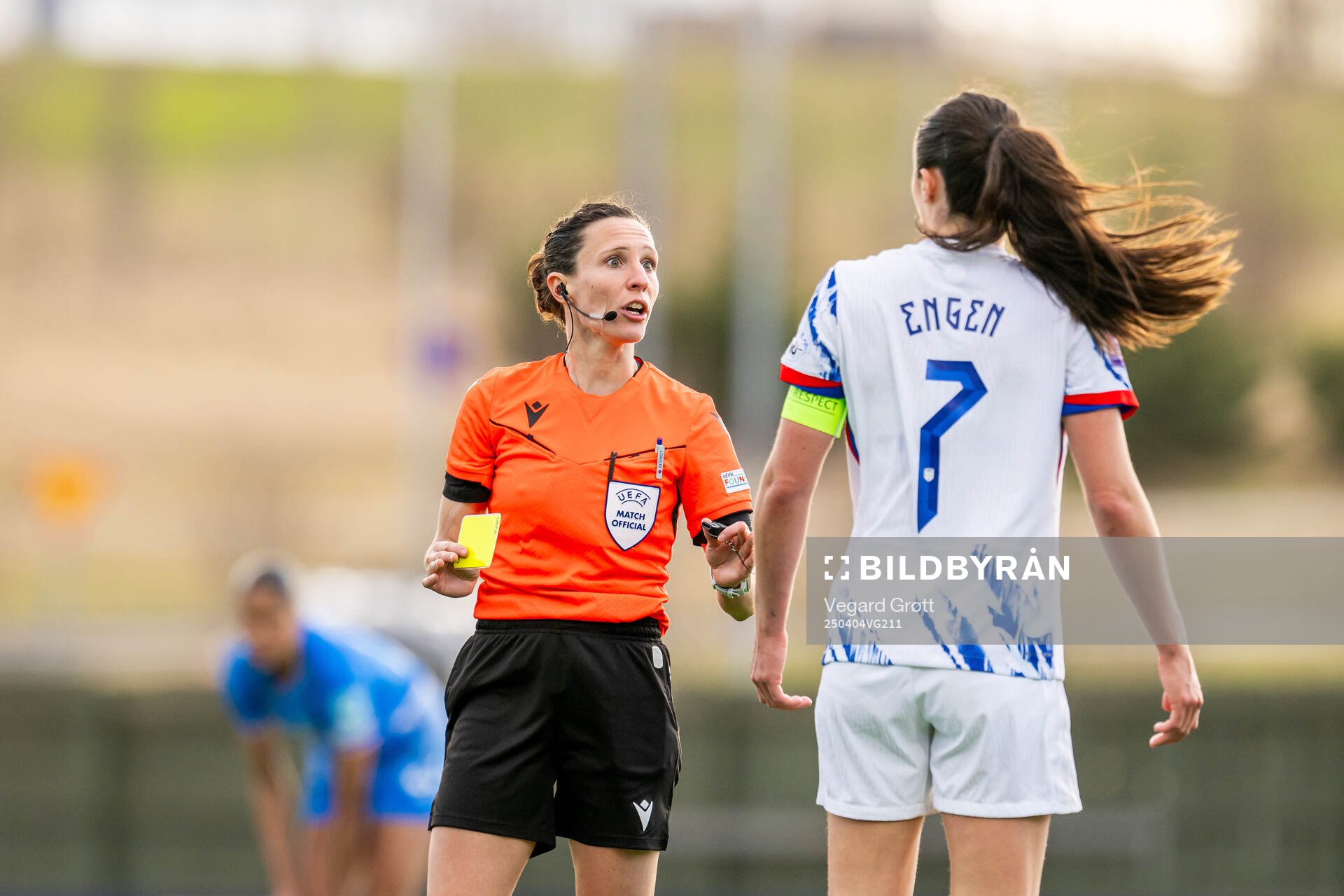 Referee Silvia Gasperotti gives a yellow card to Ingrid