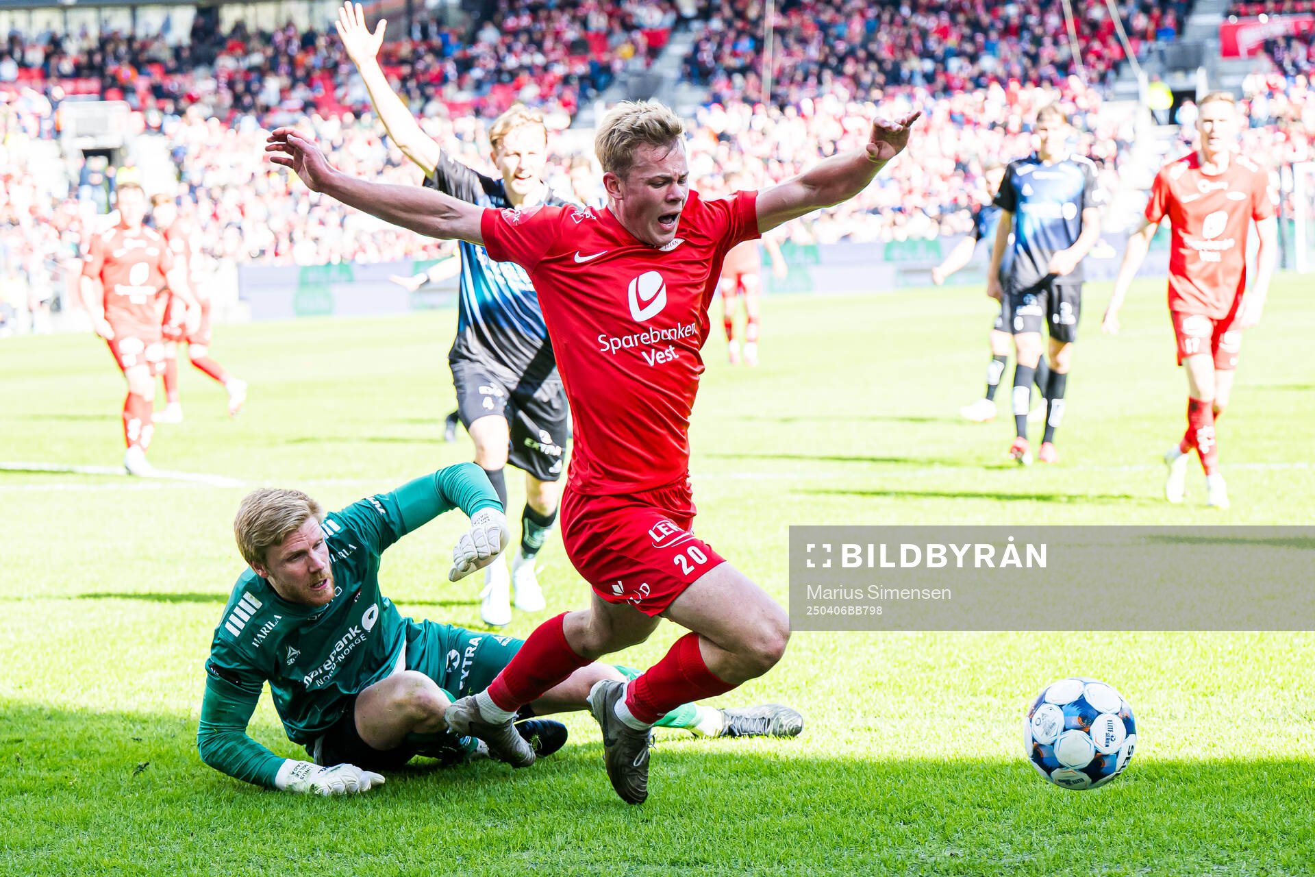 Jakob Let Haugaard of Tromsø and Aune Heggebø of Brann during the Eliteserien match between Brann and Tromsø on April 6, 2025 in Bergen. 